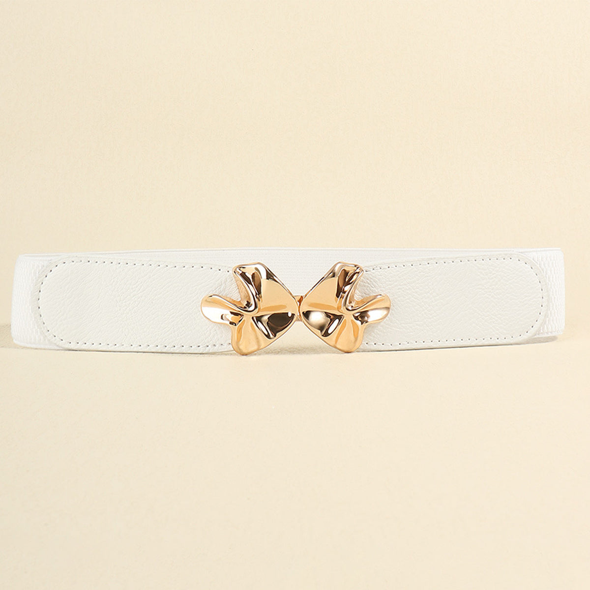 White PU elastic belt with a wide, clean silhouette, stitched edges, and a sculptural polished gold-tone alloy buckle at the center.