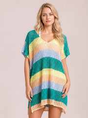 Model stands facing forward in a colorful striped V-neck short-sleeve cover up with a loose silhouette and semi-sheer openwork knit.