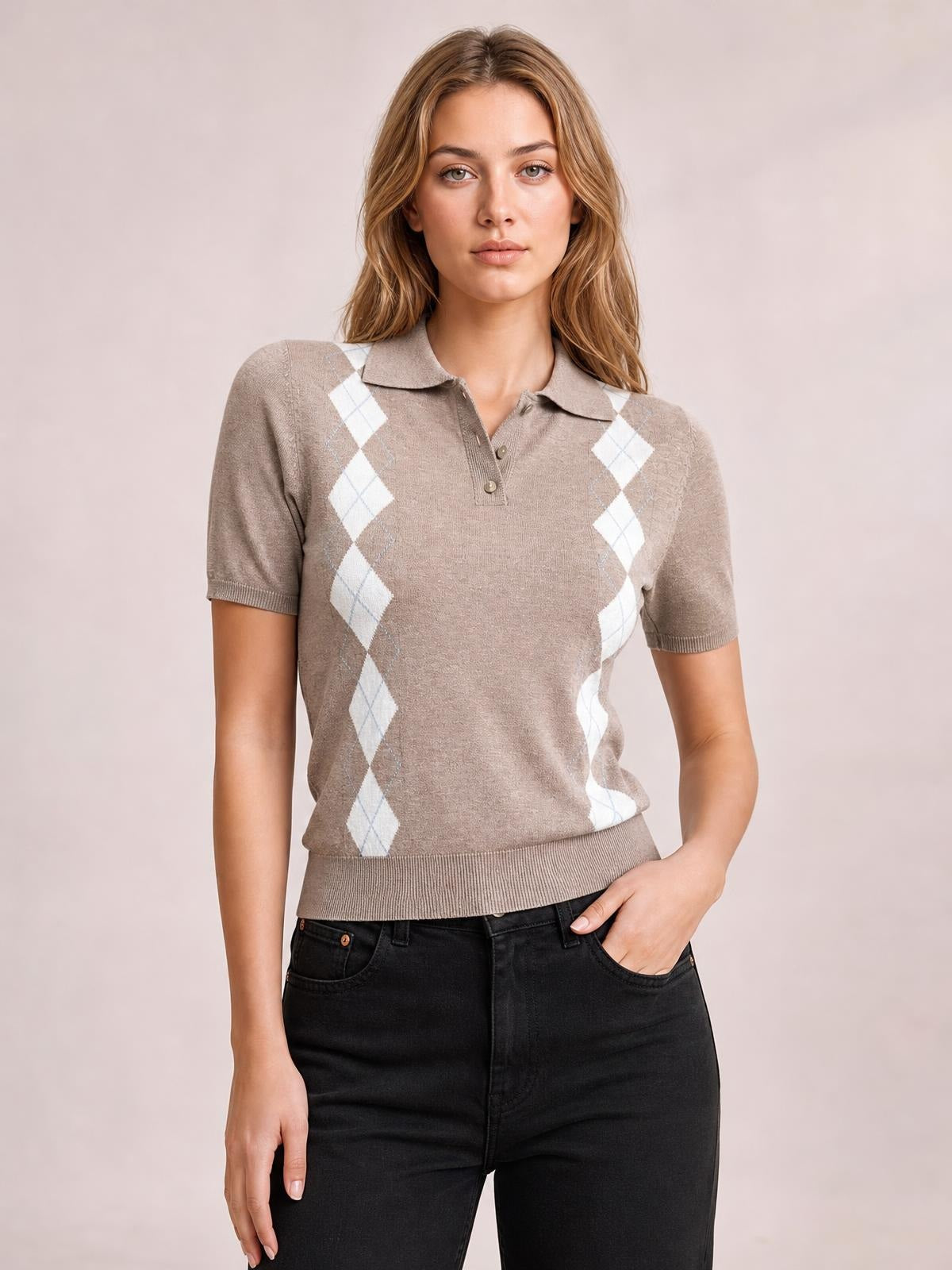 Model wears a taupe argyle patterned short sleeve sweater with a collared button placket, ribbed cuffs and hem, and a fitted silhouette.