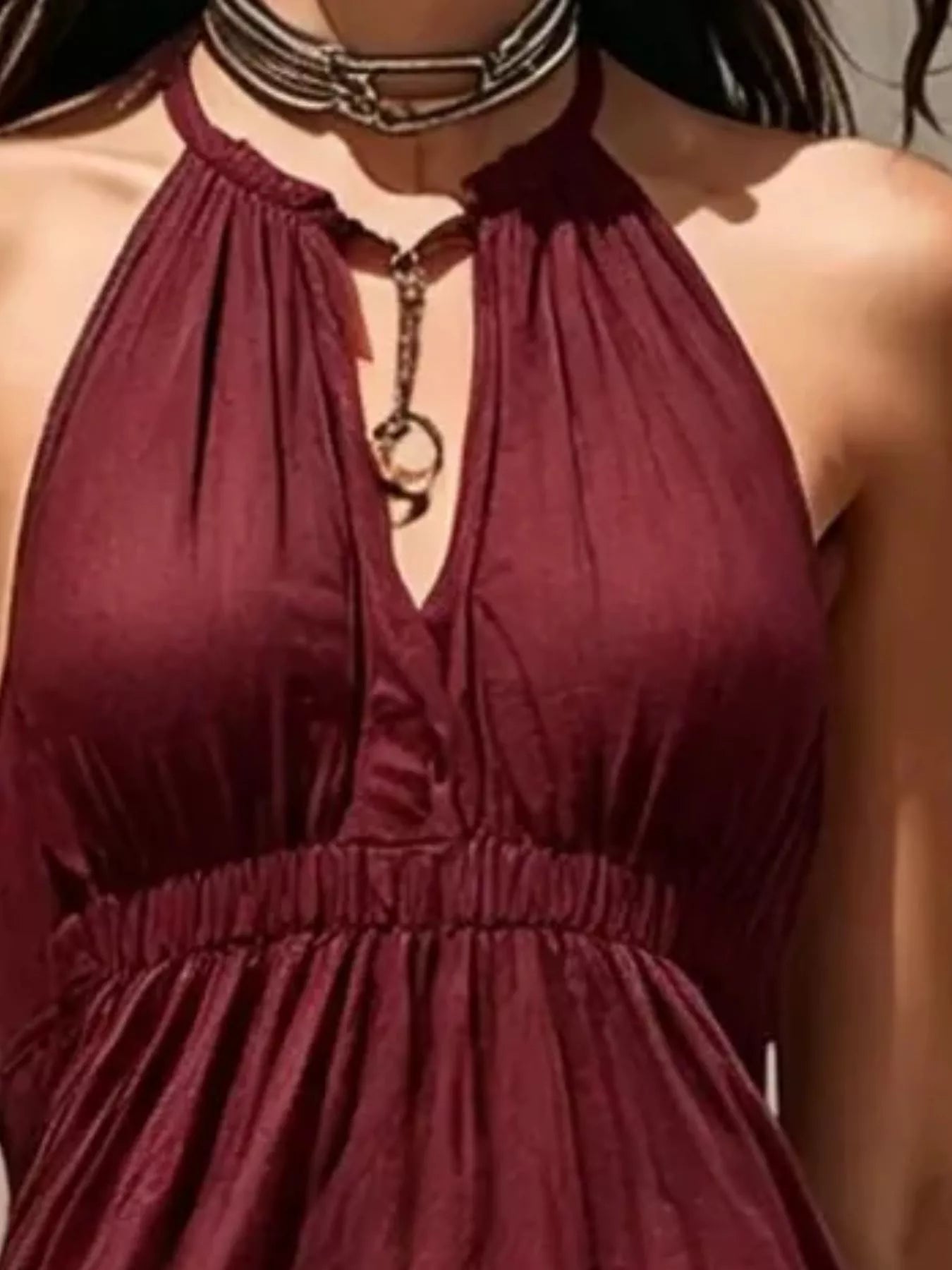 Sleeveless olive green tiered maxi dress with smocked waist and halter neckline