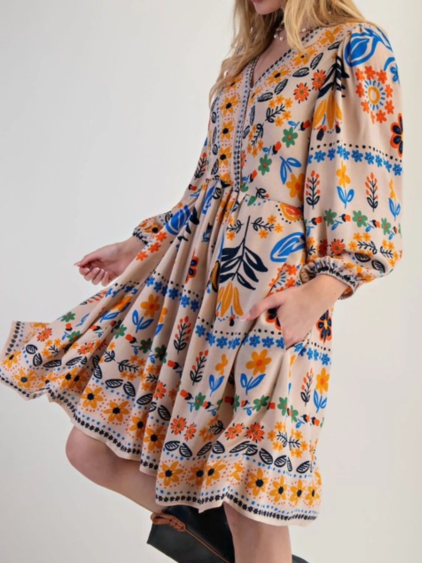 Bohemian Floral Print Long Sleeve Mini Dress with Pockets.