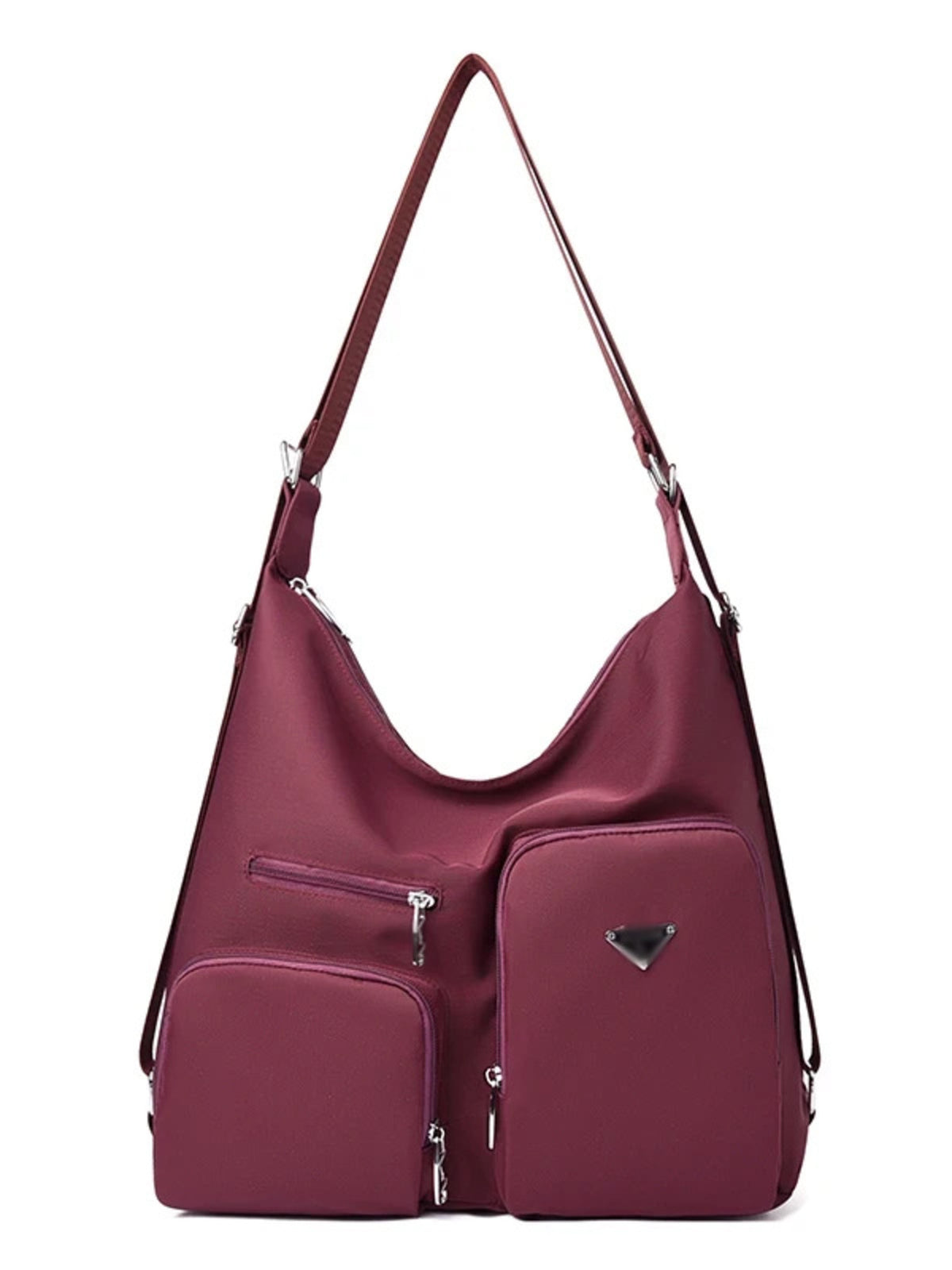 Burgundy lightweight nylon shoulder bag with a slouchy silhouette, long adjustable strap, silver hardware, and multiple front zippered pockets.
