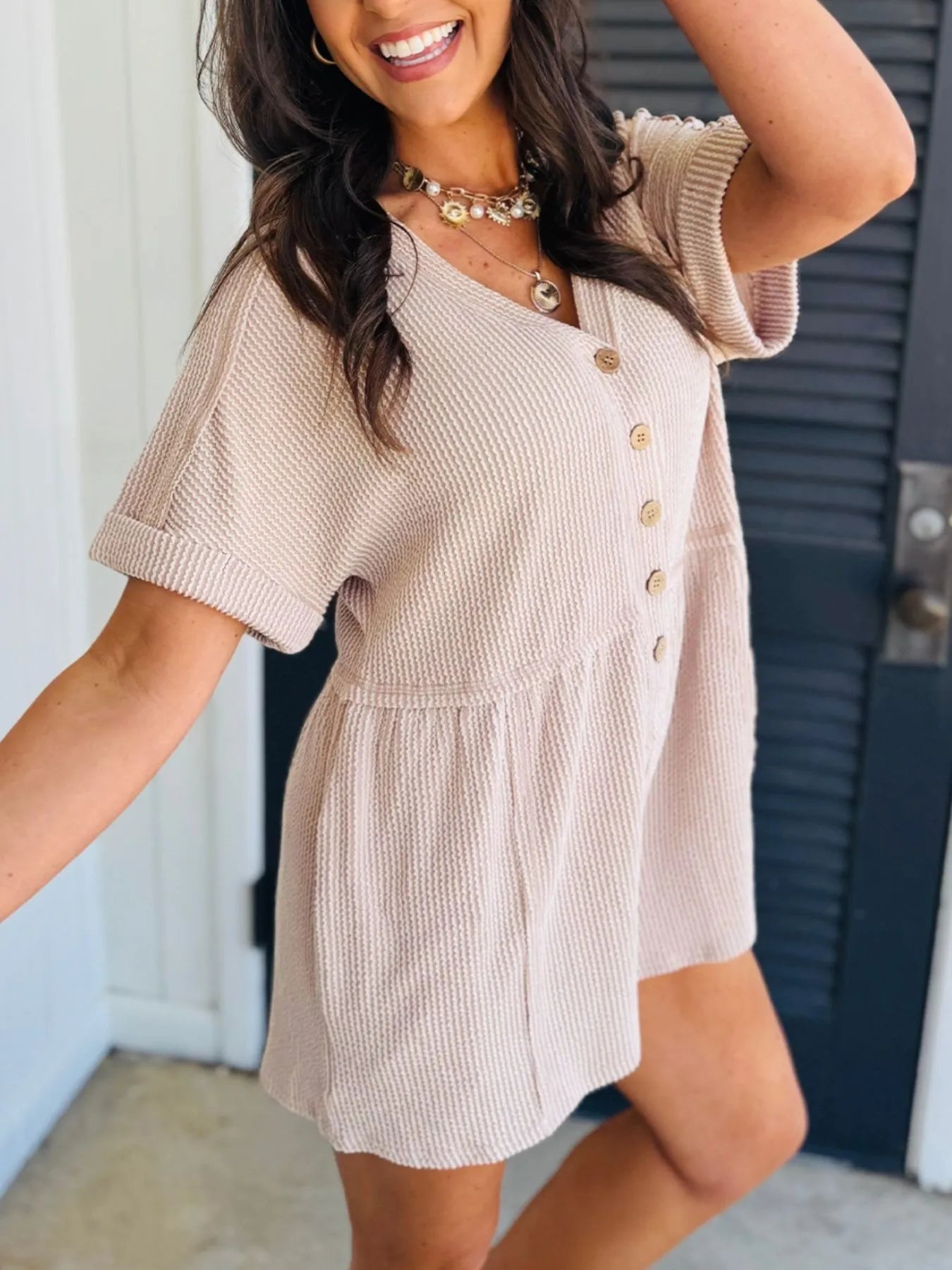 Casual Button-Front Ribbed Romper with Pockets.