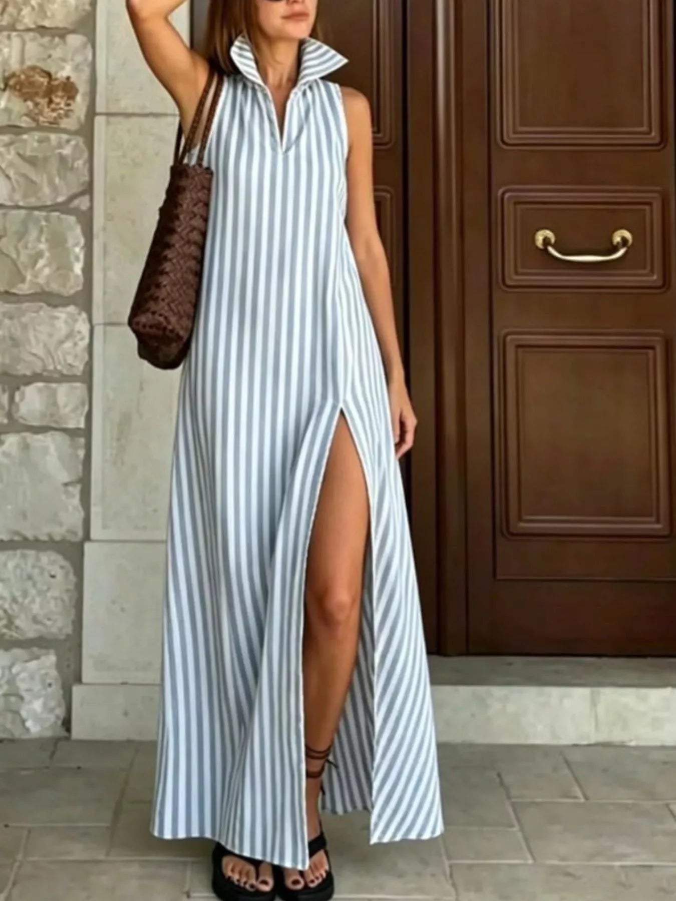 Plus-size striped polyester maxi dress with sleeveless collared design and high front slit