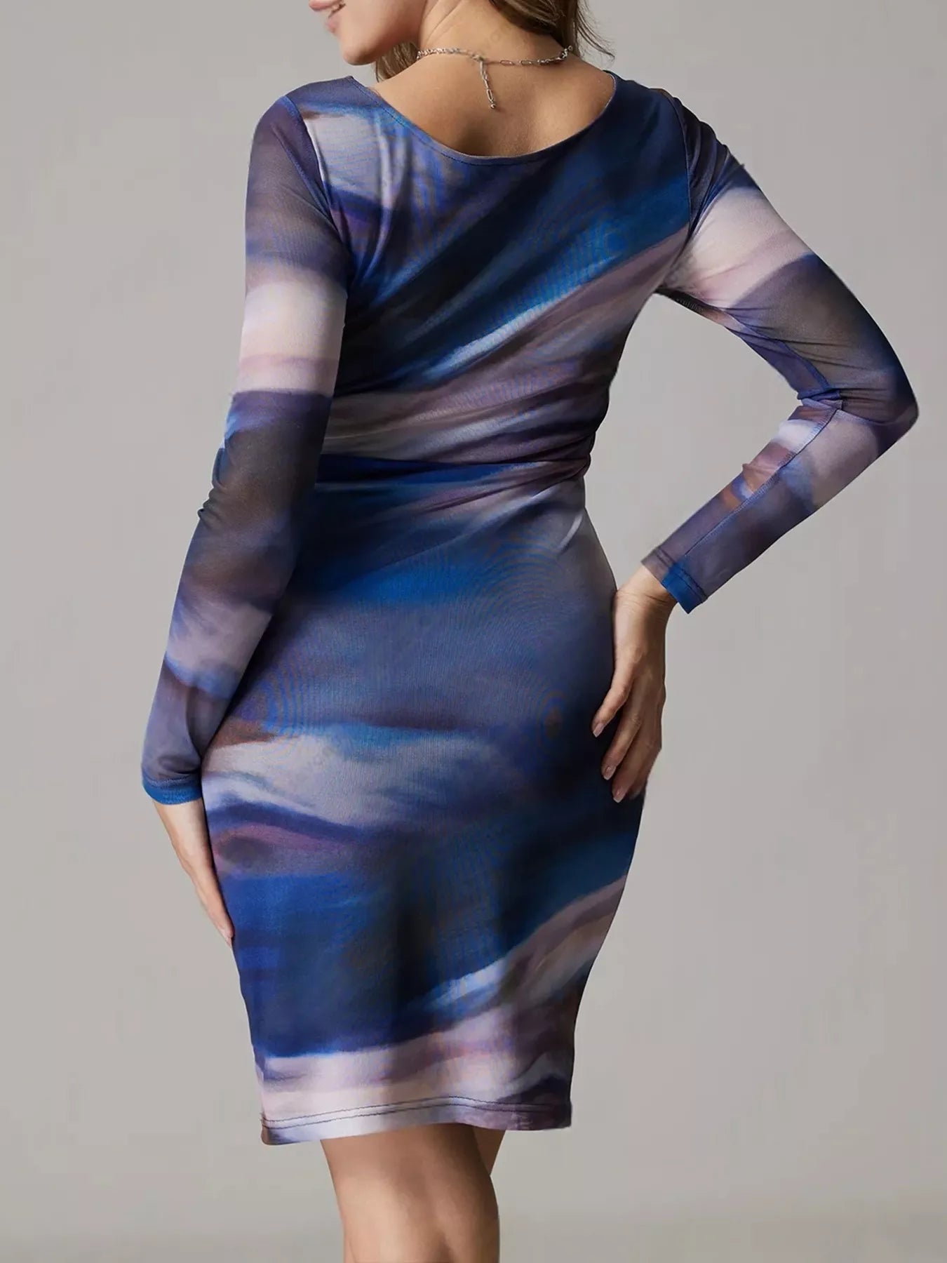 Wrap Cami Mini Dress with Tie Detail and Ruffles.