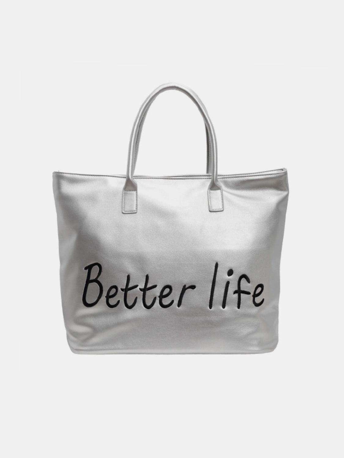 A large silver PU leather tote bag with a spacious structured silhouette, rounded top handles, stitched attachments, and bold “Better life” lettering across the front.