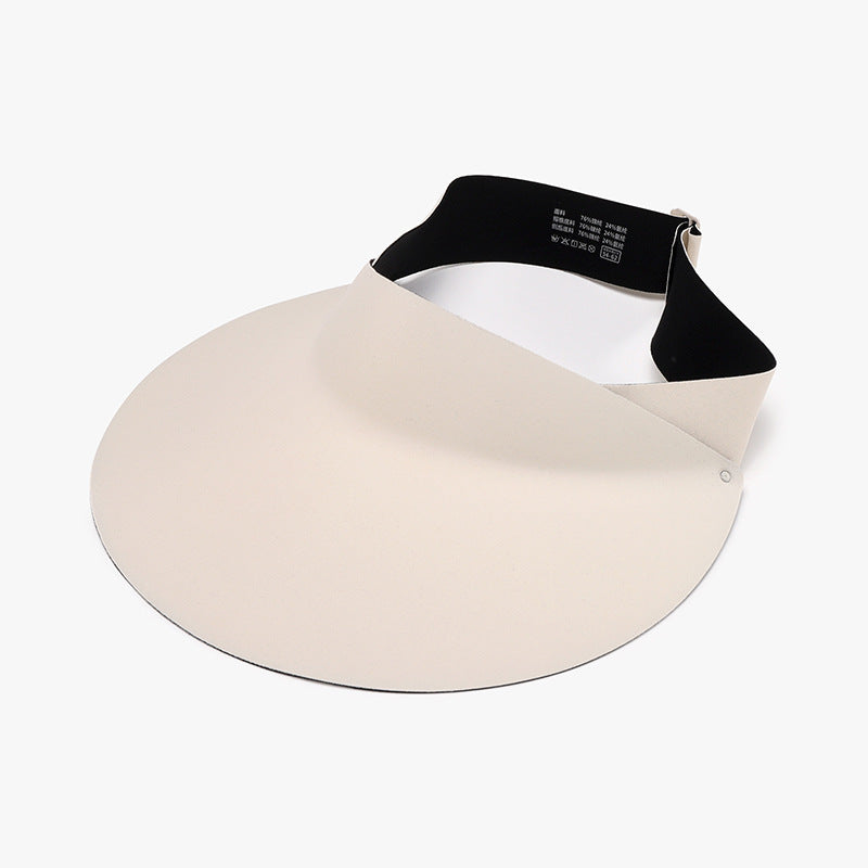 Cream breathable ice silk sun hat with a sleek open-crown visor silhouette, softly curved wide brim, and contrasting black adjustable back strap.