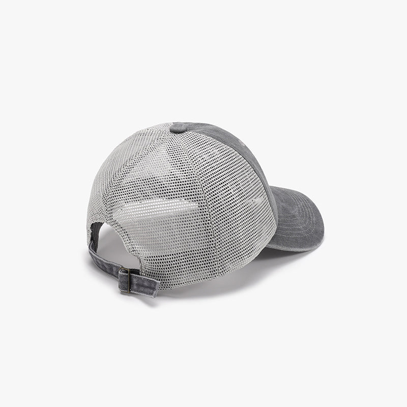 Gray breathable mesh baseball cap with a structured six-panel front, airy back and side panels, gently curved brim, and adjustable strap.