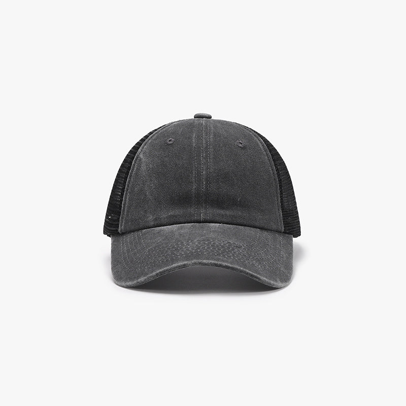 A dark gray breathable mesh baseball cap features a structured six-panel front, airy side panels, and a gently curved brim for a relaxed sporty silhouette.