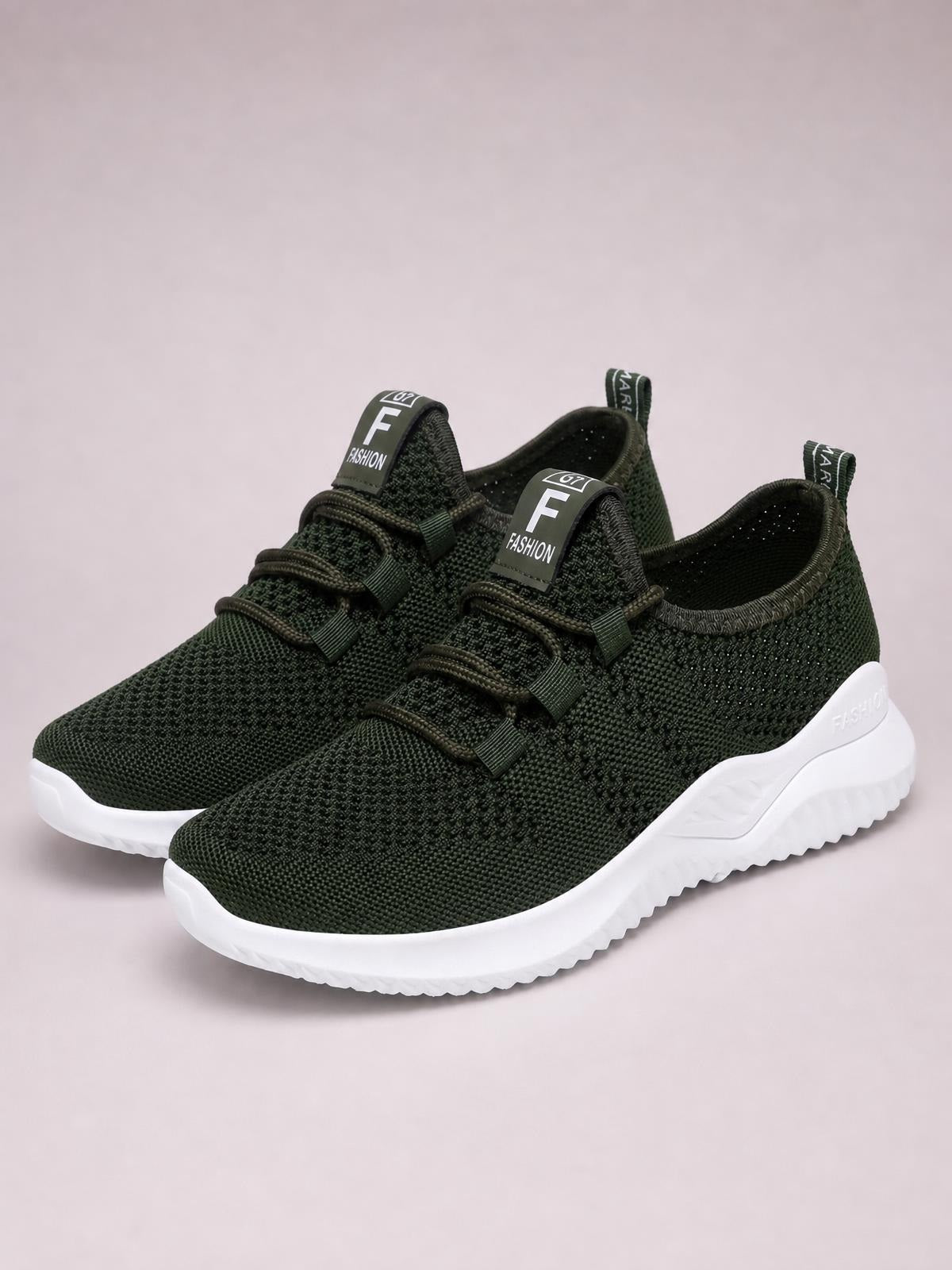 Dark green breathable mesh athletic sneakers feature lace-up fronts, low-profile flat silhouettes, padded collars, pull tabs, and thick white rubber soles.