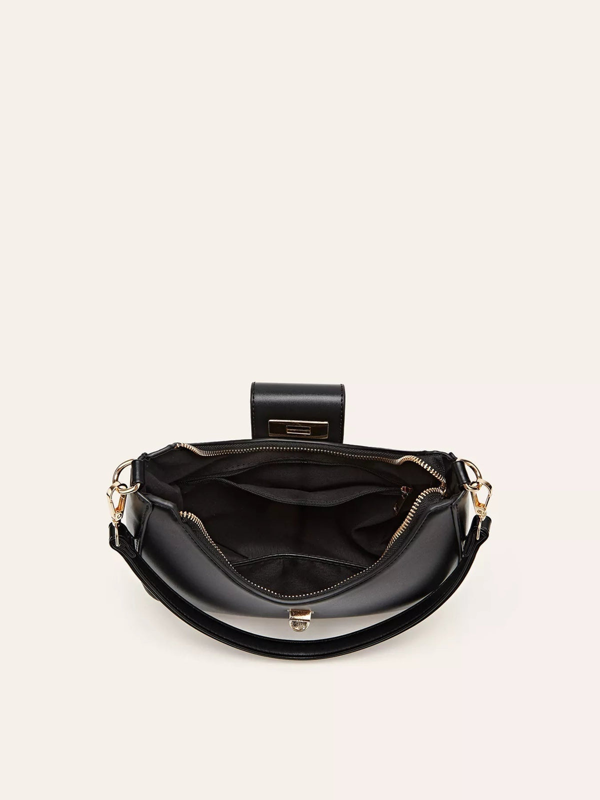 Small black PU leather shoulder bag shown open, featuring a buckle closure, gold-tone hardware, multiple zip compartments, and a structured curved silhouette.