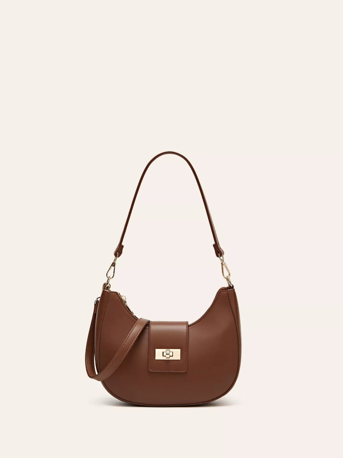 Small brown PU leather shoulder bag with a curved silhouette, adjustable strap, stitched flap, and gold-tone buckle closure.