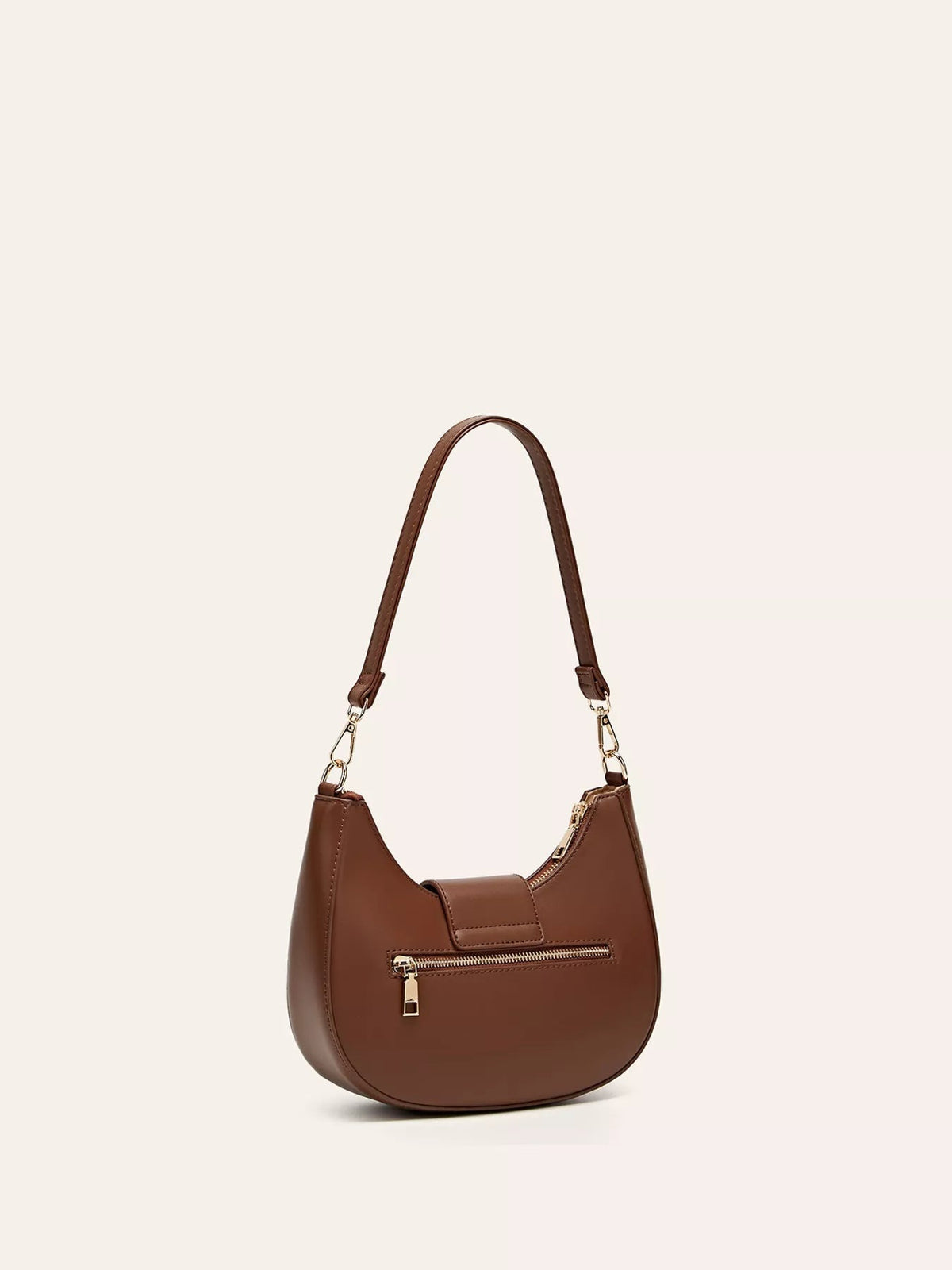 Small brown PU leather shoulder bag with a curved hobo silhouette, long shoulder strap, front zip pocket, and buckle closure detail.