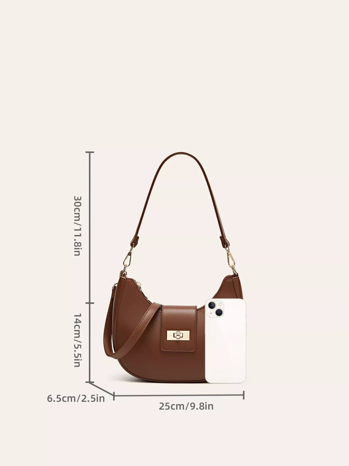 Small brown PU leather shoulder bag with a curved silhouette, stitched construction, long strap, and gold-tone buckle closure on the front flap.