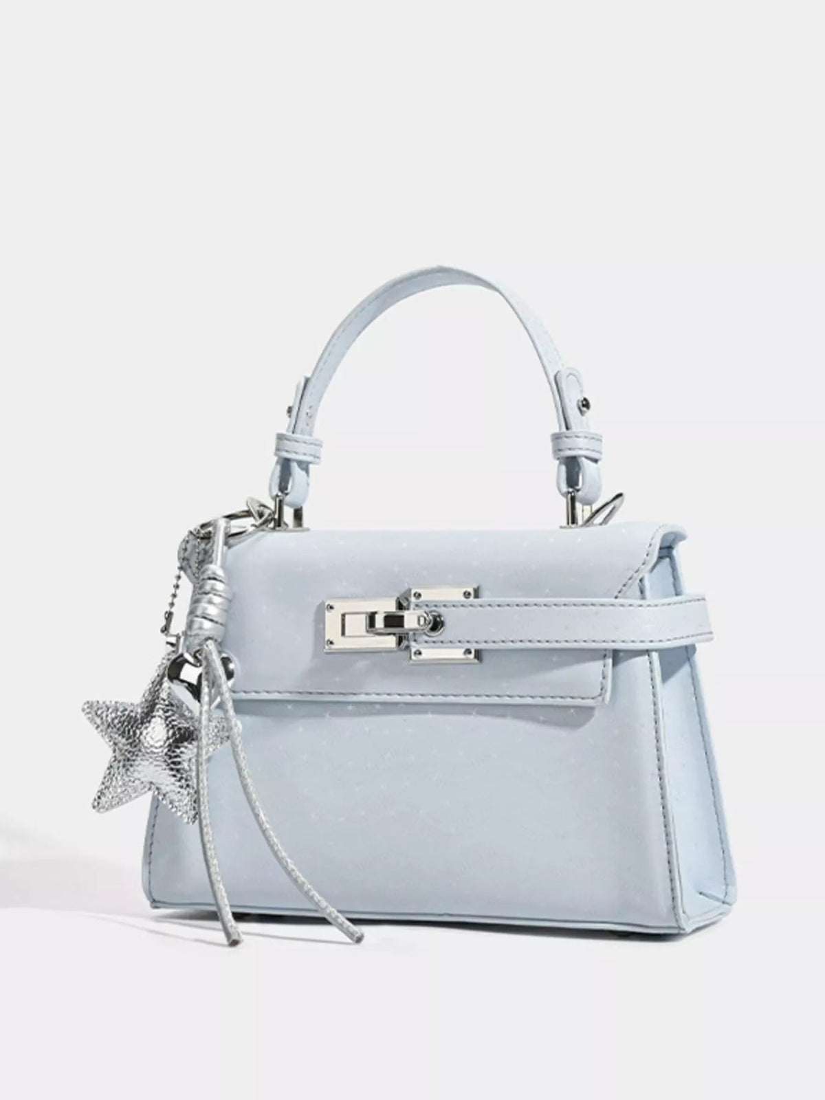 Light blue mini PU leather handbag with a structured silhouette, top handle, front buckle closure, silver-tone hardware, and a detachable shoulder strap.