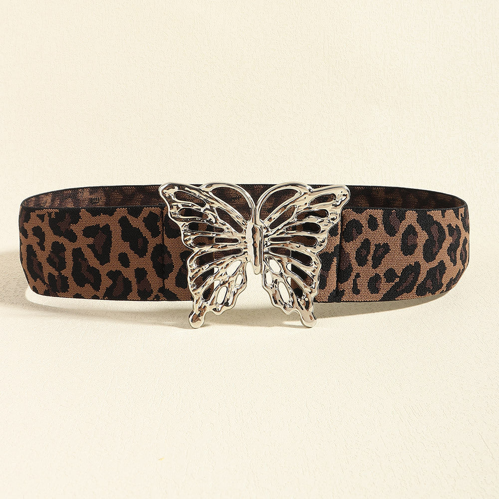Leopard-print elastic belt with a wide band and polished silver-tone alloy butterfly buckle for a bold, feminine waist accent.