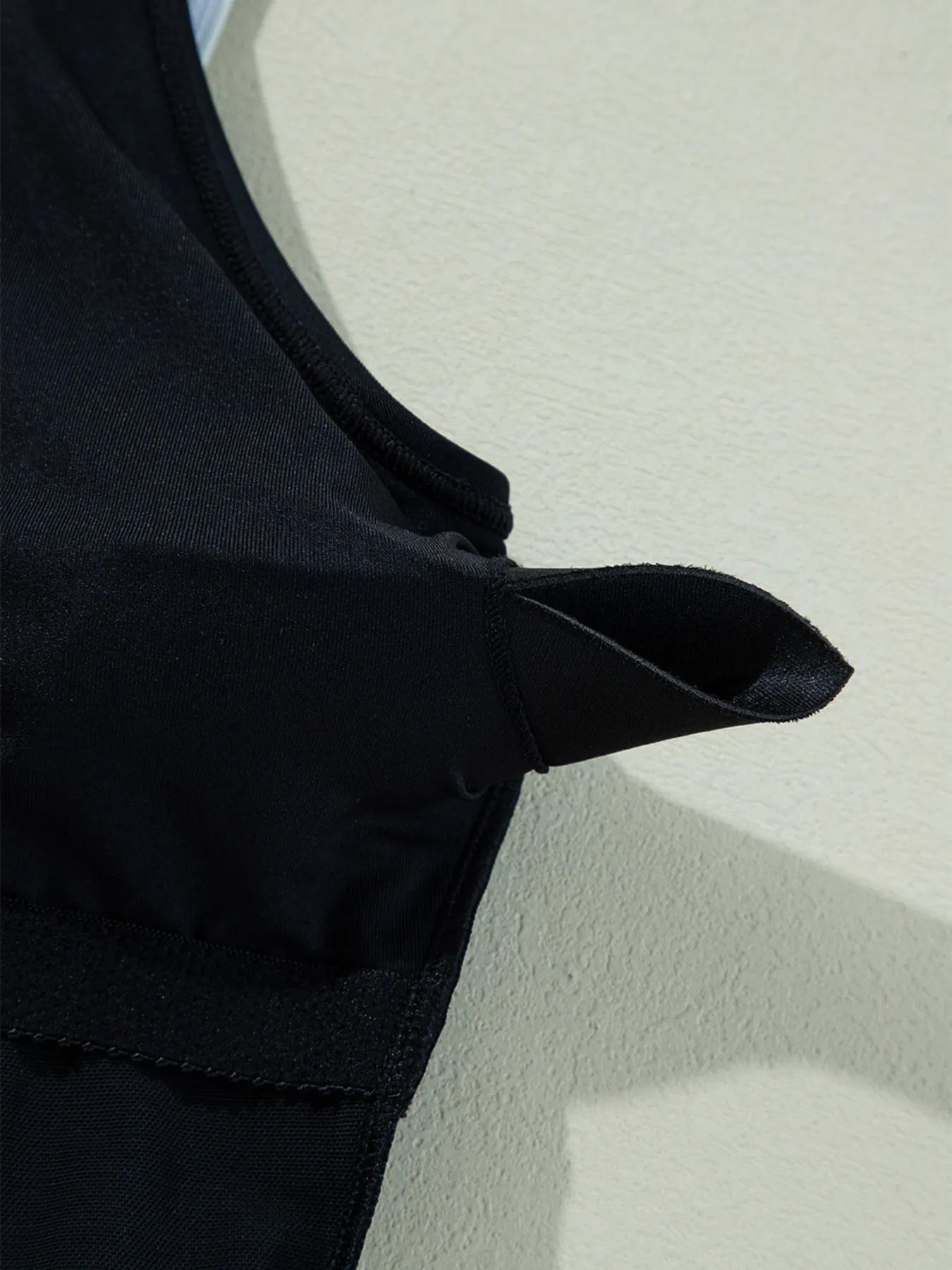 Ruffle Trim V-Neck One-Piece Swimsuit with Removable Padding.