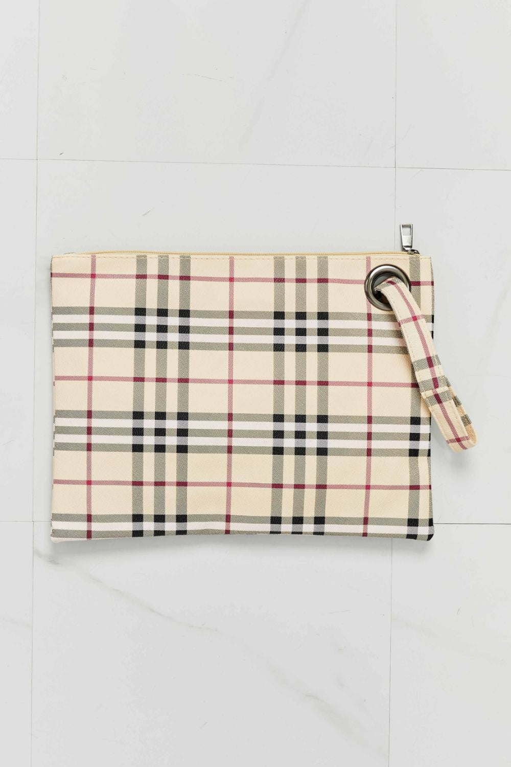 Cream, black, and pink plaid PU leather wristlet with a clean rectangular silhouette, zip-top closure, and attached wrist strap.