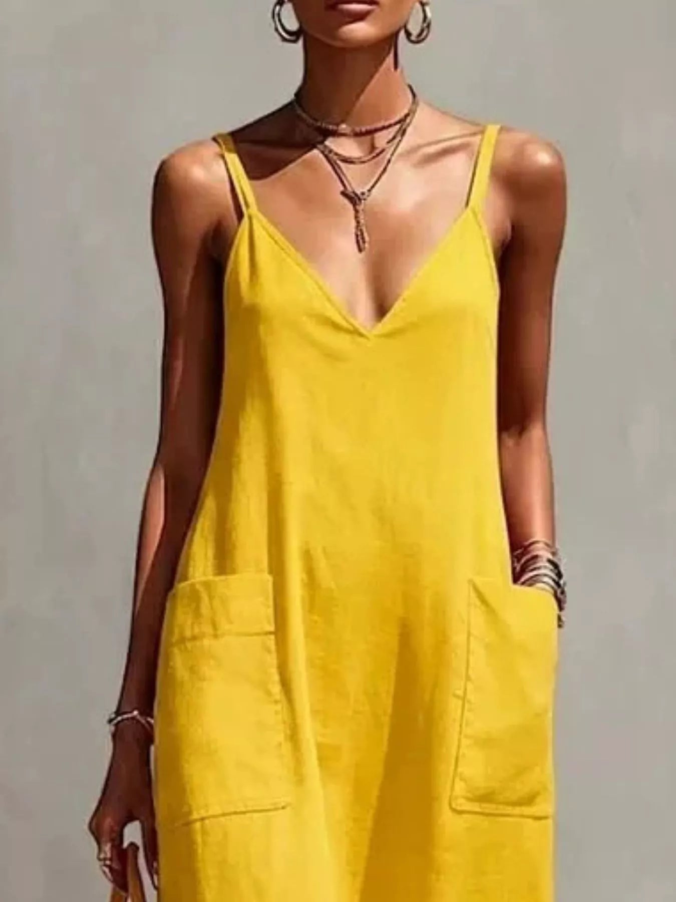 Plus-size V-neck spaghetti strap midi dress with fringe hem and pockets