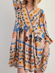 Bohemian Floral Print Long Sleeve Mini Dress with Pockets.