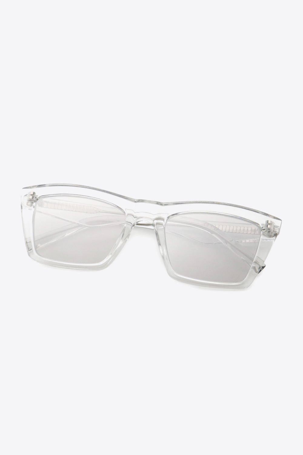 Light gray, softly translucent cellulose propionate rectangle sunglasses feature gently rounded lower corners, matching temples, and clear acetate lenses.