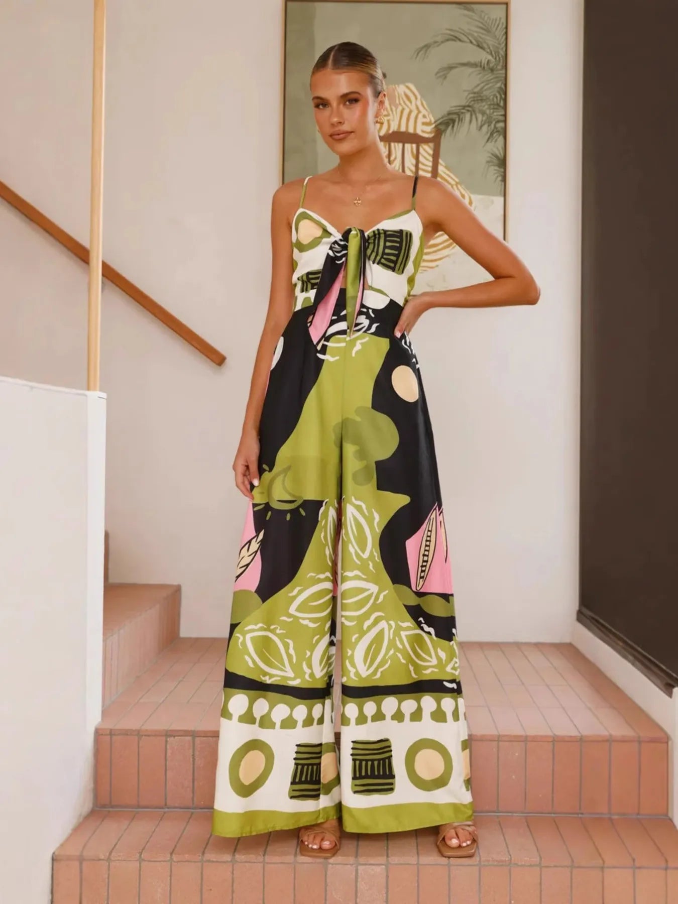 Printed Sweetheart Neck Jumpsuit with Smocked, Tie, and Pockets.