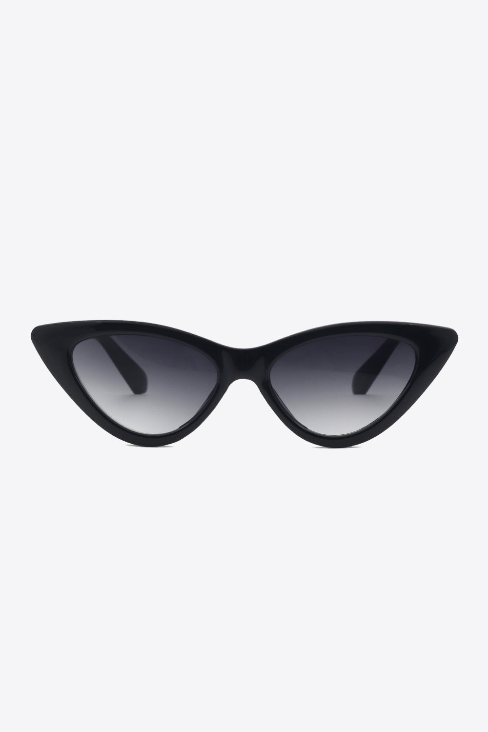 Black cat-eye sunglasses feature a glossy upswept frame, rounded lenses with a dark-to-clear gradient, and a defined statement silhouette.
