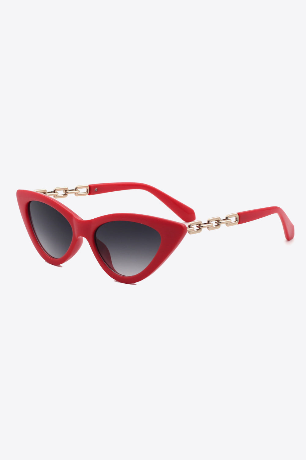 Red cat-eye sunglasses feature an upswept silhouette, dark lenses, and distinctive gold-tone chain detailing along the temples.