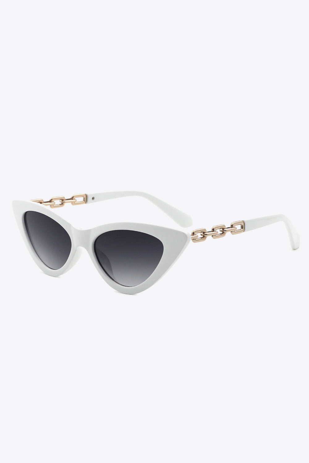White cat-eye sunglasses feature an upswept polycarbonate frame, dark gradient lenses, and polished chain detailing along the temples.