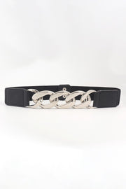 A black elastic waist belt features structured PU end sections and a bold polished silver linked-chain centerpiece for a sculptural statement accent.