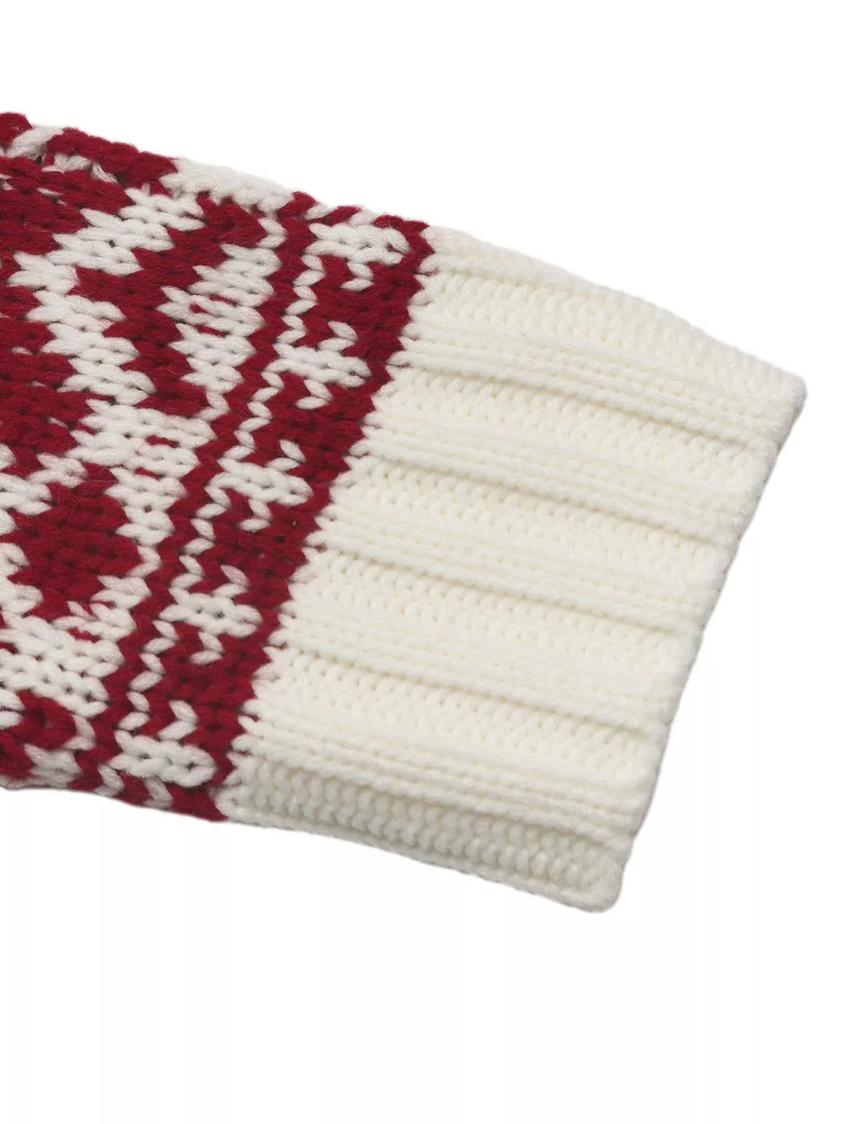A close-up shows the Christmas sweater’s red-and-cream knit sleeve with a patterned cuff and wide ribbed cream finish.