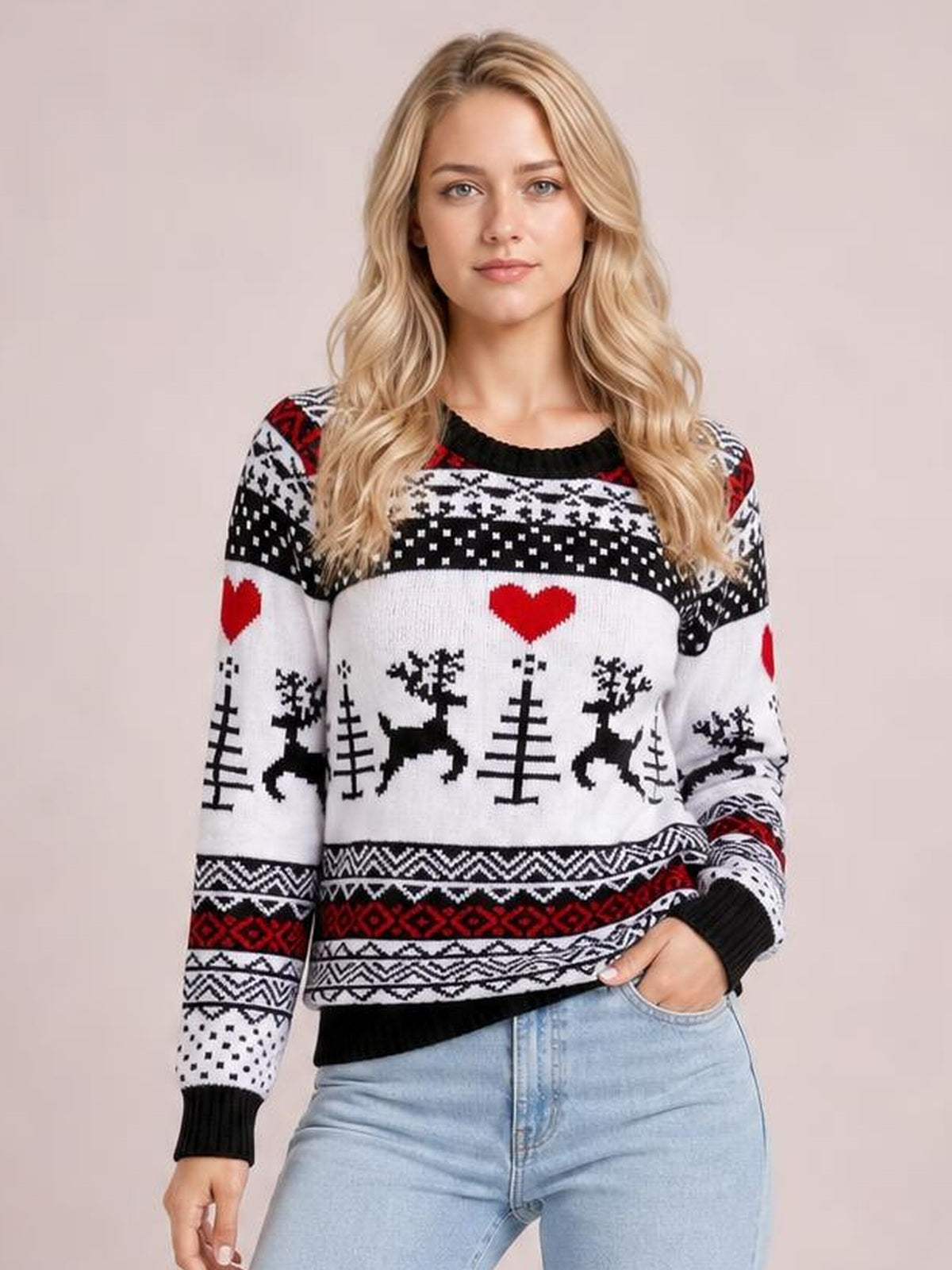 Model wears a black, white, and red Christmas round neck sweater with reindeer, hearts, snowflakes, patterned bands, ribbed cuffs, and hem.