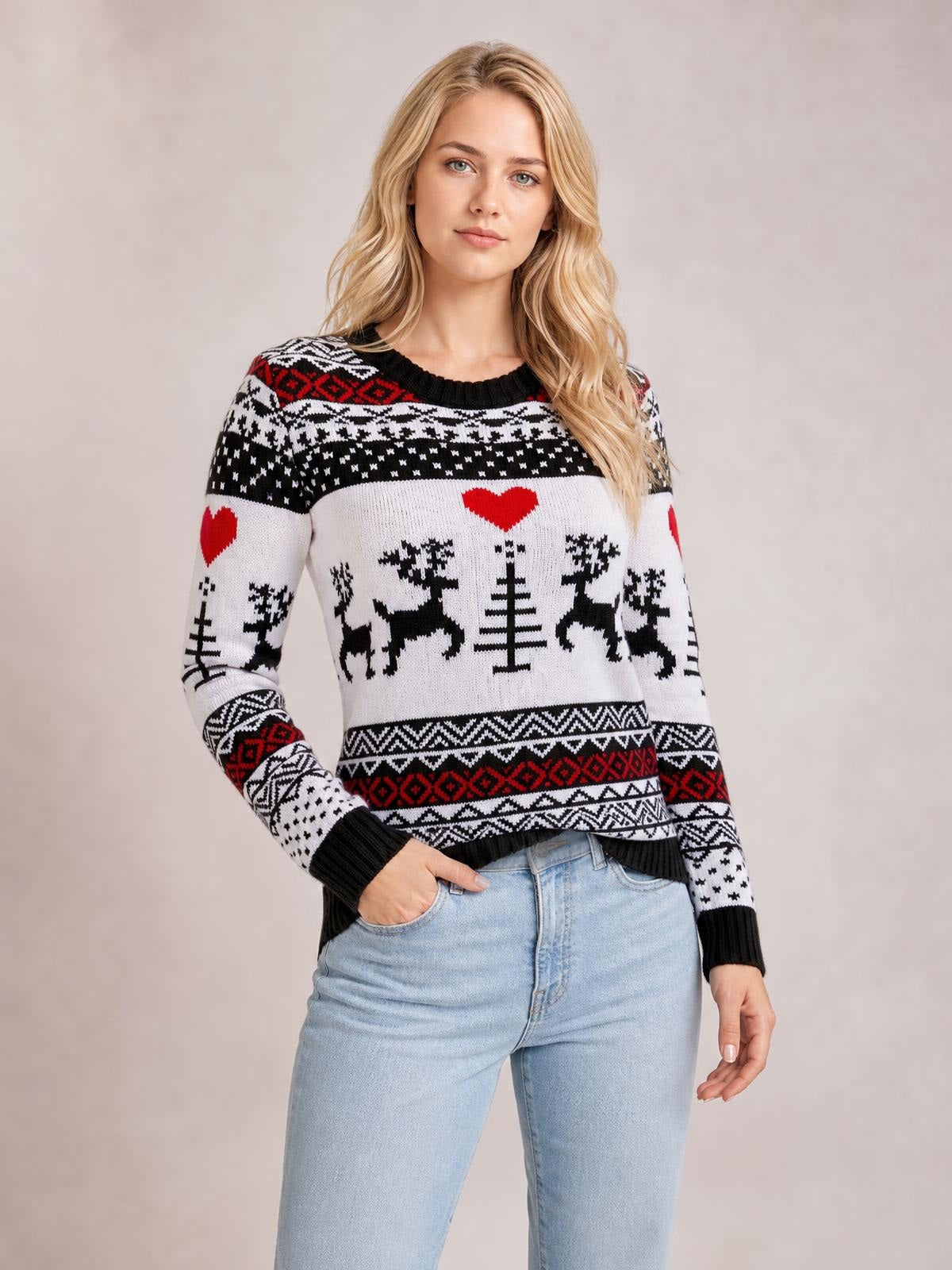 A woman models a black, white, and red Christmas round-neck sweater with reindeer, hearts, patterned bands, long sleeves, and ribbed trims.