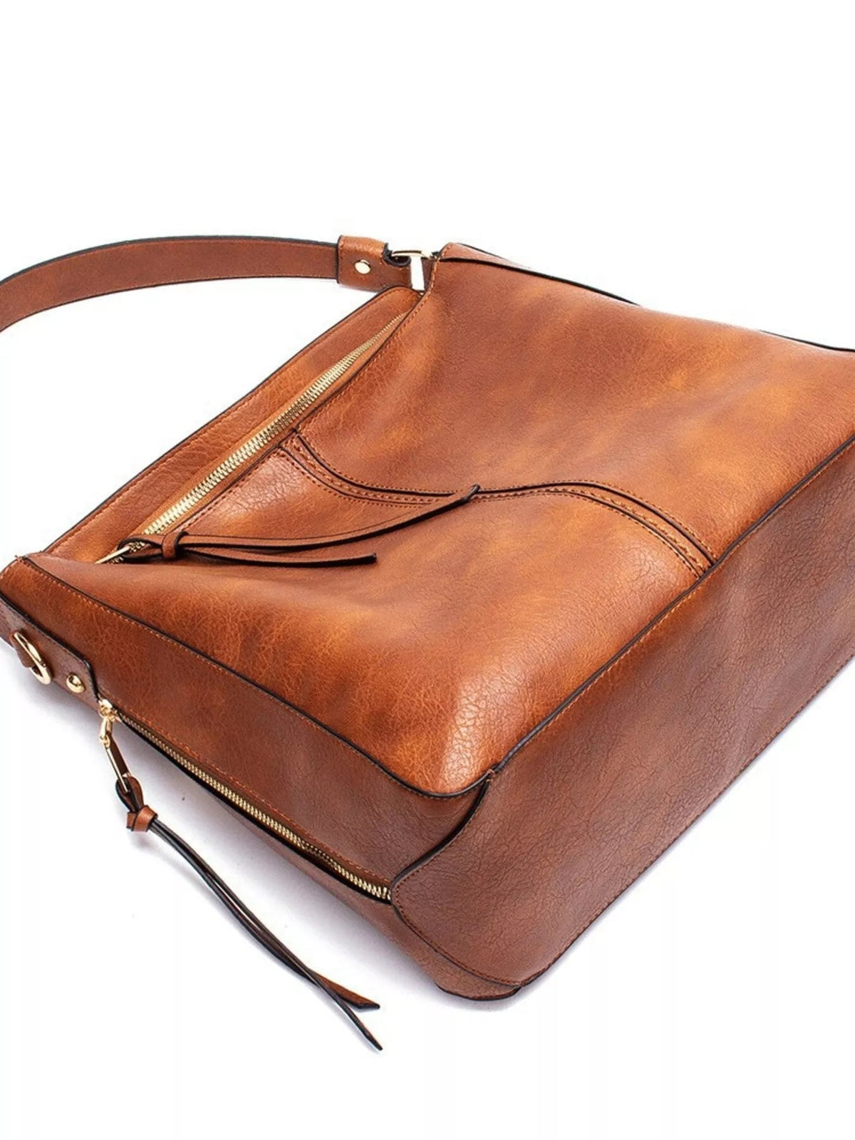 Classic medium brown PU leather tote bag with a structured rectangular silhouette, zippered compartments, stitched panels, and an adjustable shoulder strap.