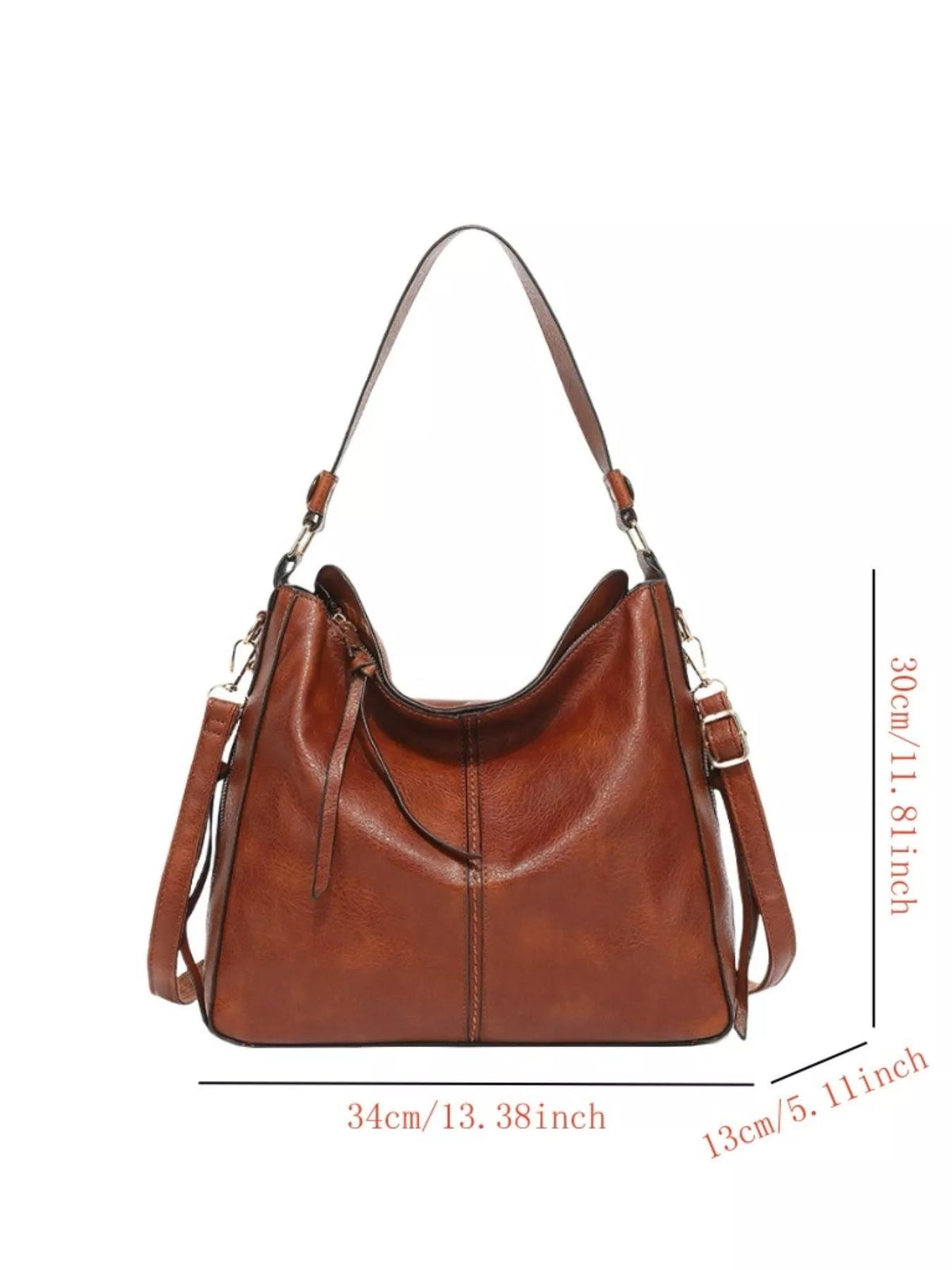 Medium brown PU leather tote bag with a softly structured silhouette, curved open top, long shoulder strap, side attachments, and front center seam.