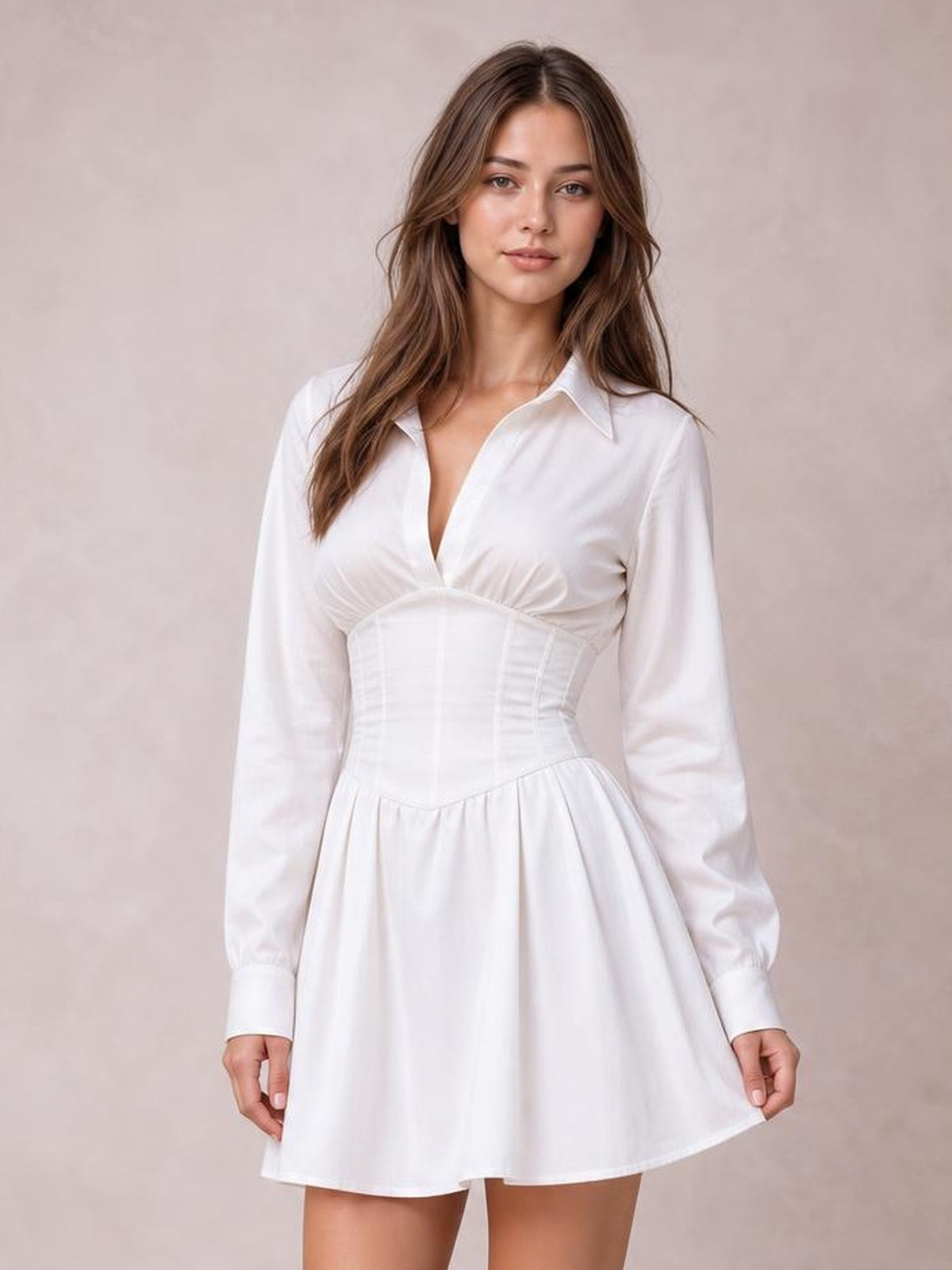 A model stands in a white collared-neck mini dress with ruched bust detailing, structured seamed bodice, long lantern sleeves, and a flared skirt.
