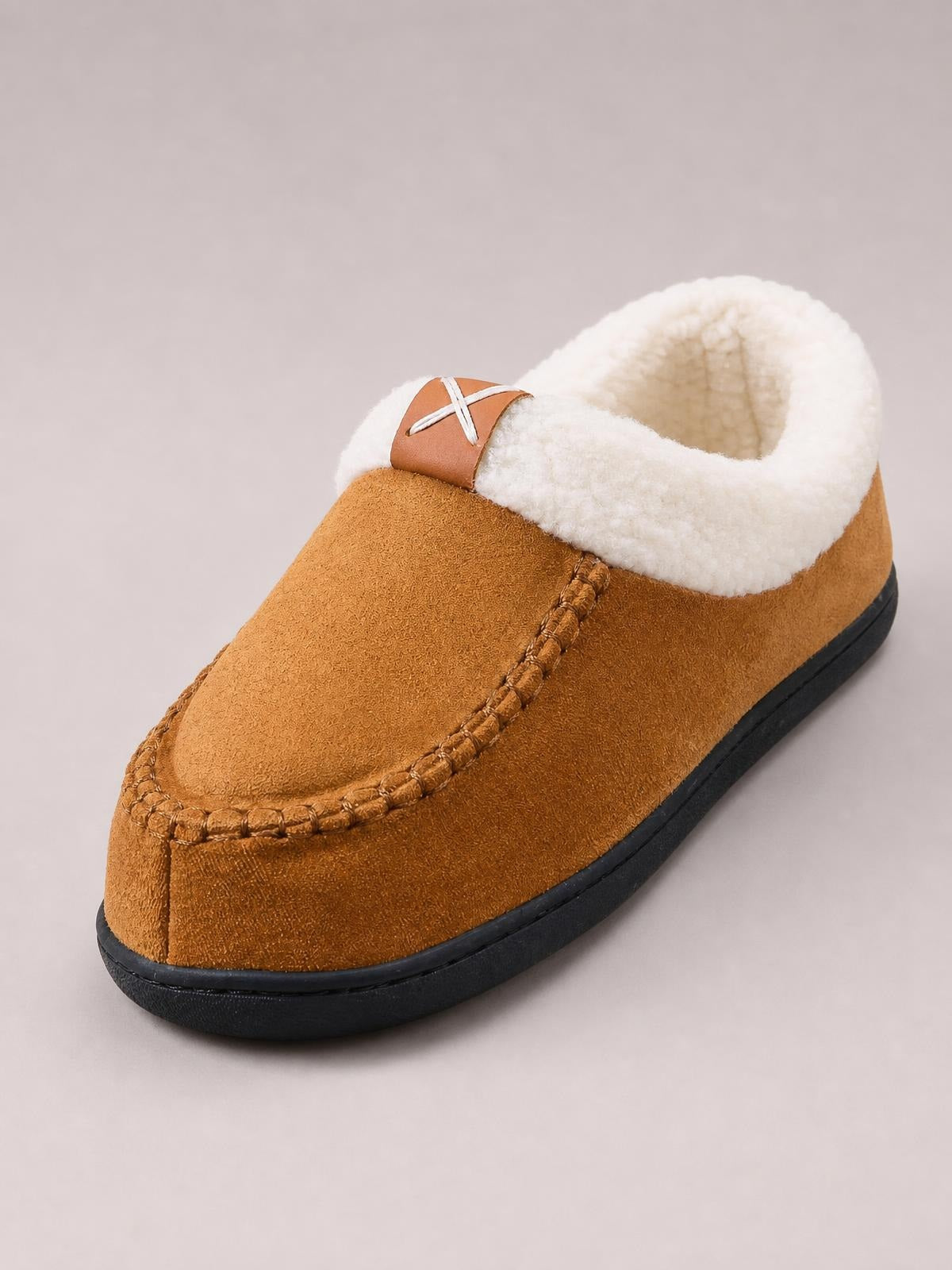 Brown contrast round toe flat slippers with plush cream lining, moccasin-style stitched construction, white crisscross laces, and black TPR soles.