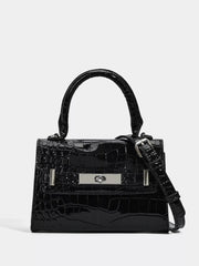 Small black croc-embossed PU leather handbag with a structured silhouette, rounded top handle, silver turn-lock closure, and detachable shoulder strap.