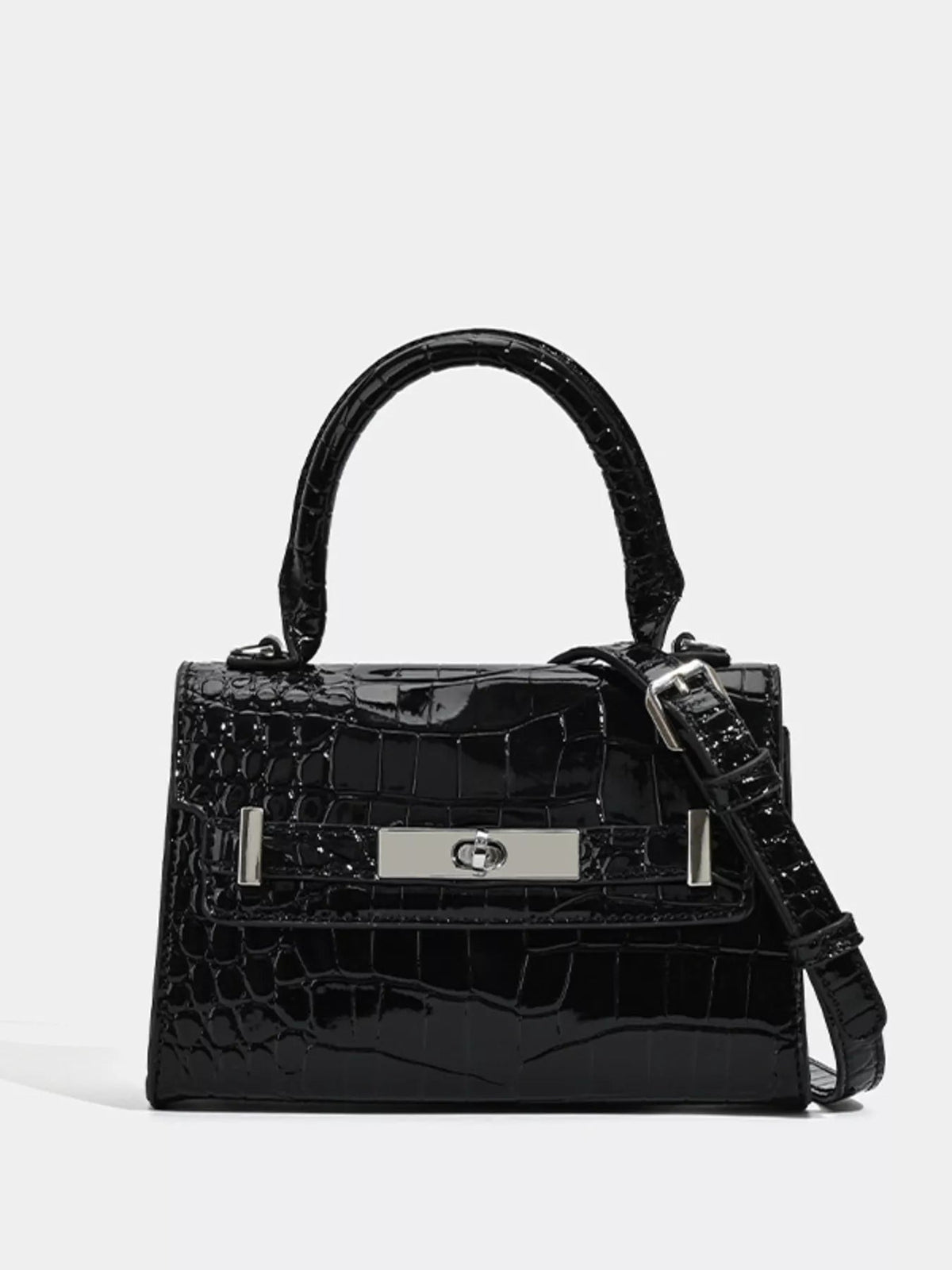Small black croc-embossed PU leather handbag with a structured silhouette, rounded top handle, silver turn-lock closure, and detachable shoulder strap.