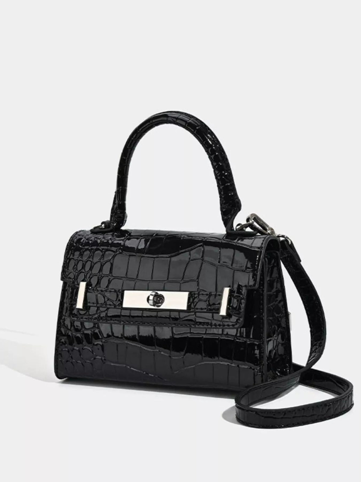 Small black PU leather croc-embossed handbag with a structured silhouette, top handle, front clasp detail, and detachable shoulder strap.