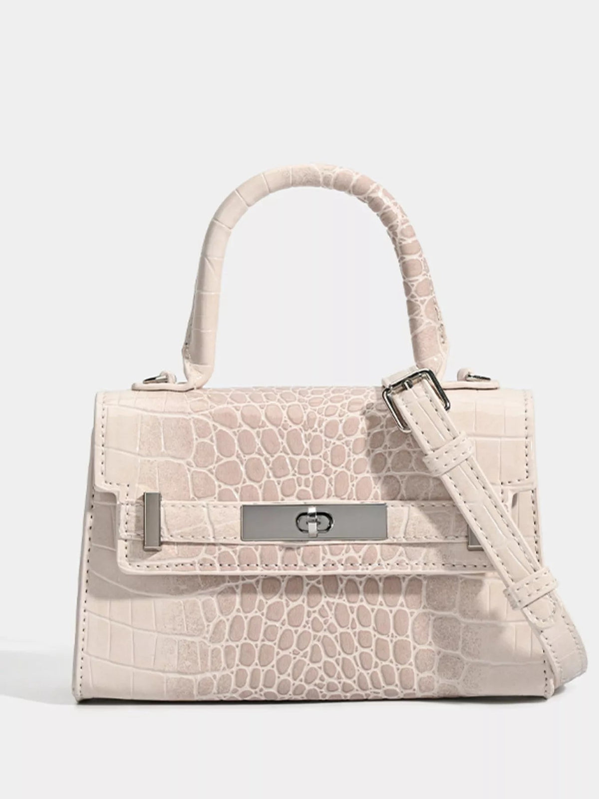 Small cream croc-embossed PU leather handbag with a structured silhouette, top handle, flap closure, turn-lock hardware, and detachable shoulder strap.