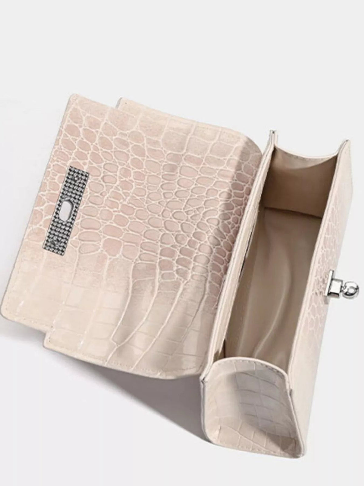 Open small pale beige croc-embossed PU leather handbag with a structured silhouette, flap closure, silver-tone clasp, and spacious interior.