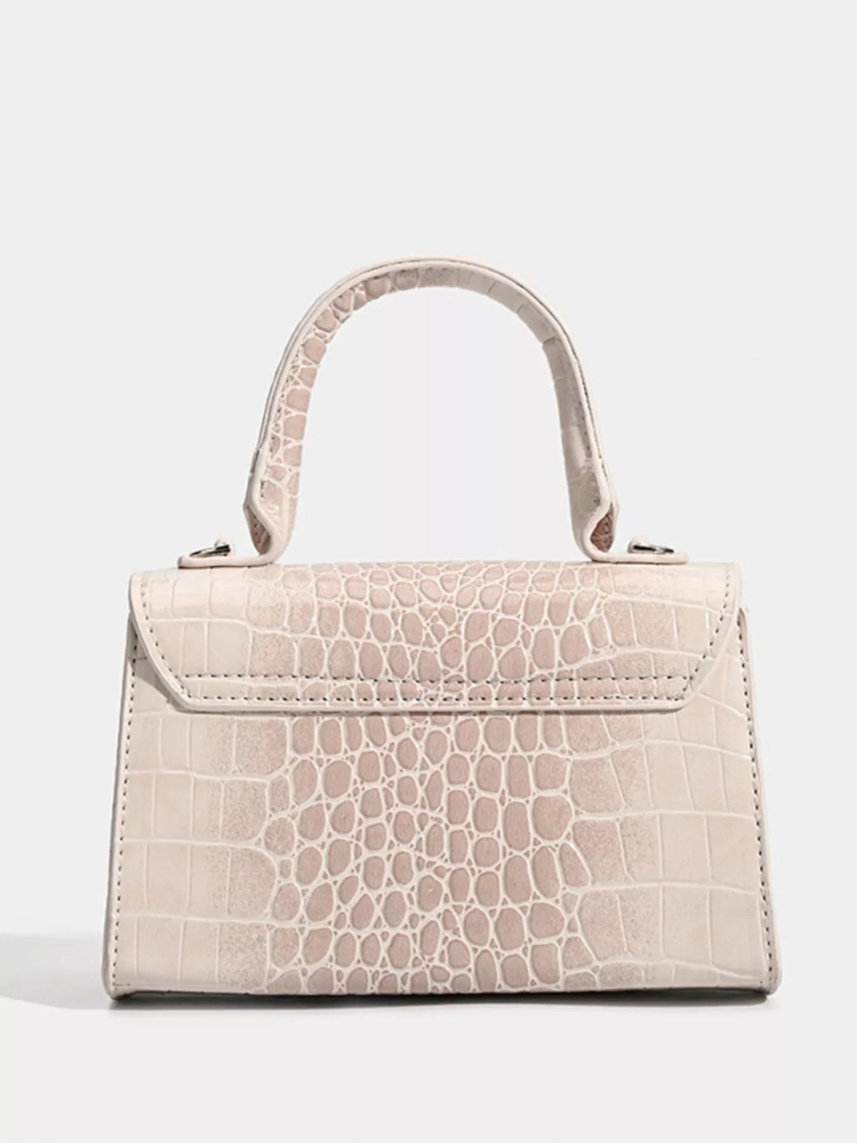 Small cream PU leather handbag with a structured rectangular silhouette, croc-embossed finish, top handle, flap closure, and neat contrast stitching.