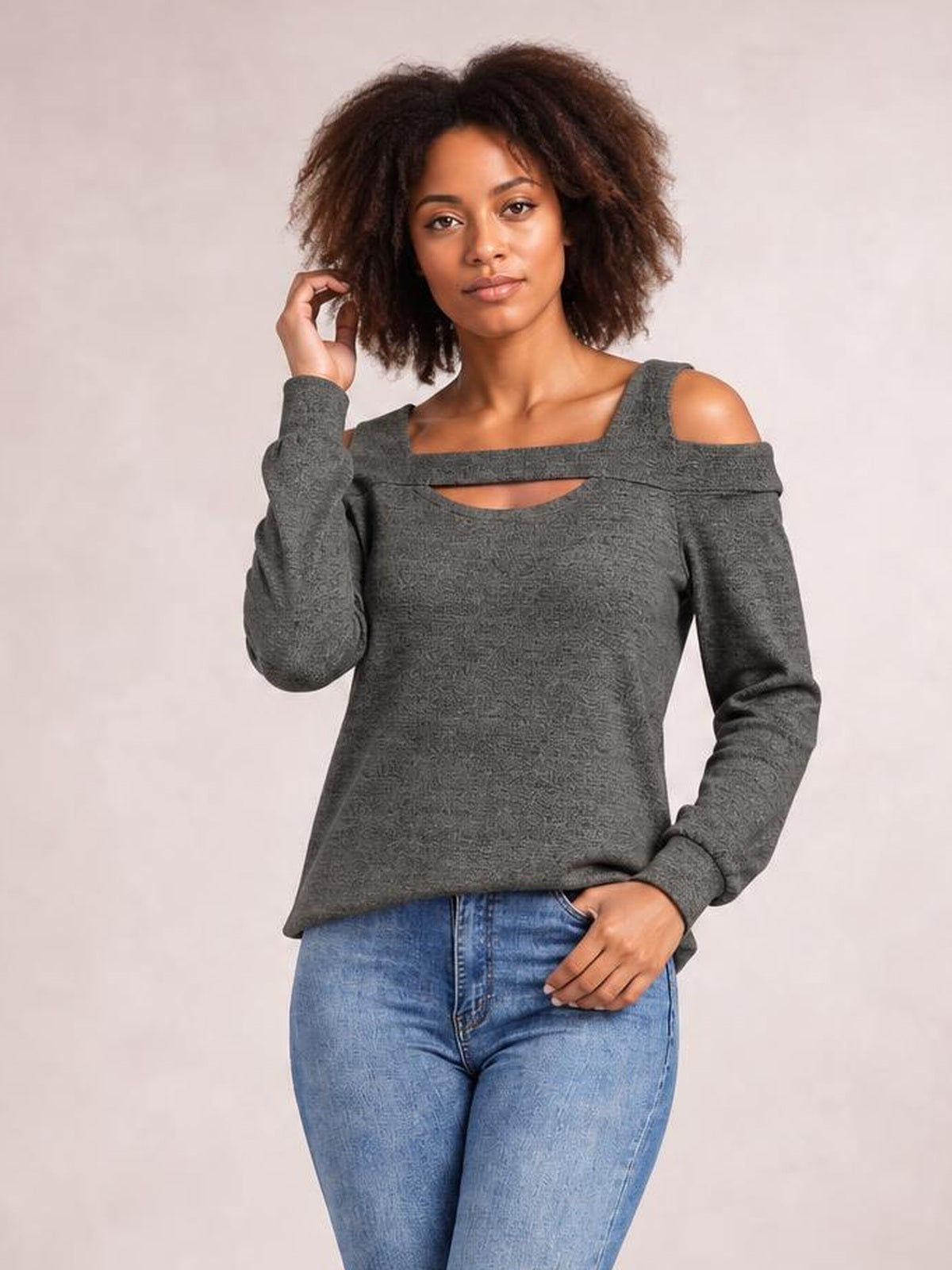 Model poses in a gray solid cutout cold-shoulder top with a square neckline, long sleeves, and a relaxed regular-length silhouette.