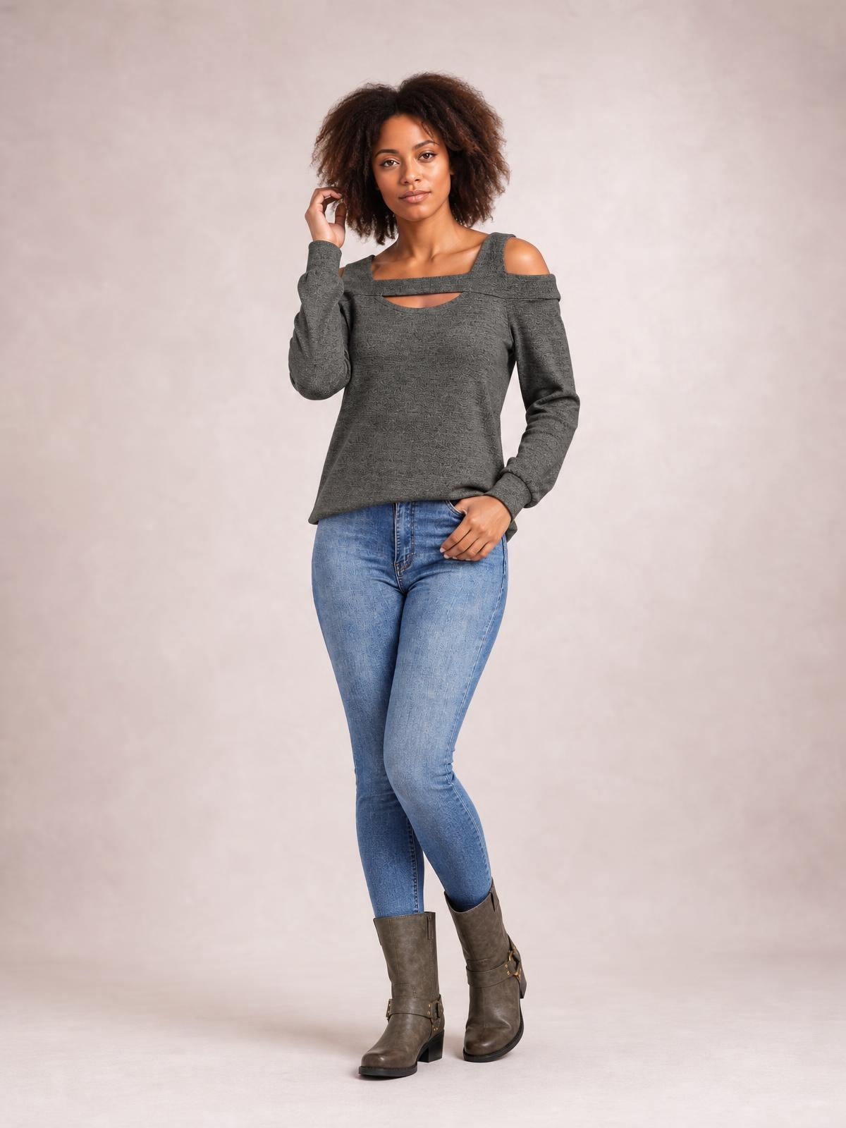Model wearing a solid gray cold-shoulder top with a square neckline, chest cutout, long sleeves, and a relaxed regular-length silhouette.