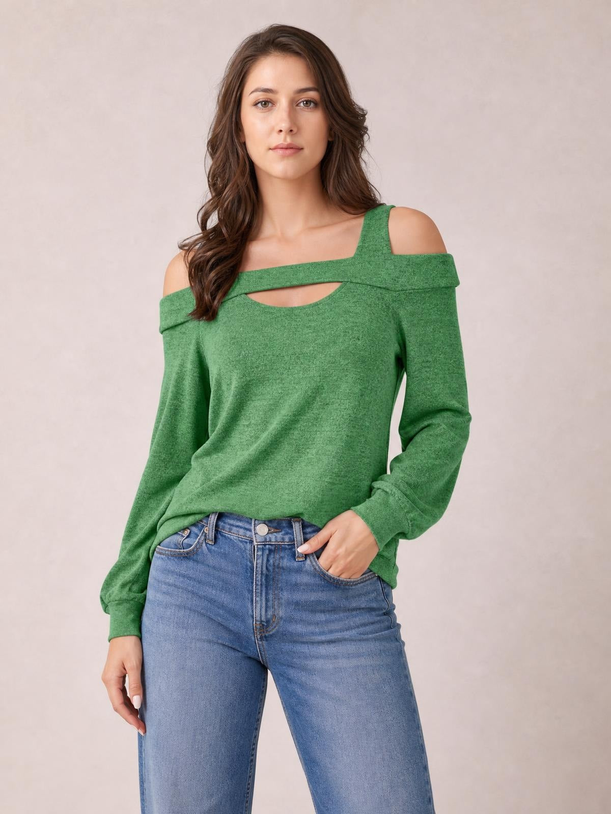 Model poses in a green solid cutout cold-shoulder top with a square neckline, long sleeves, and a relaxed regular silhouette.