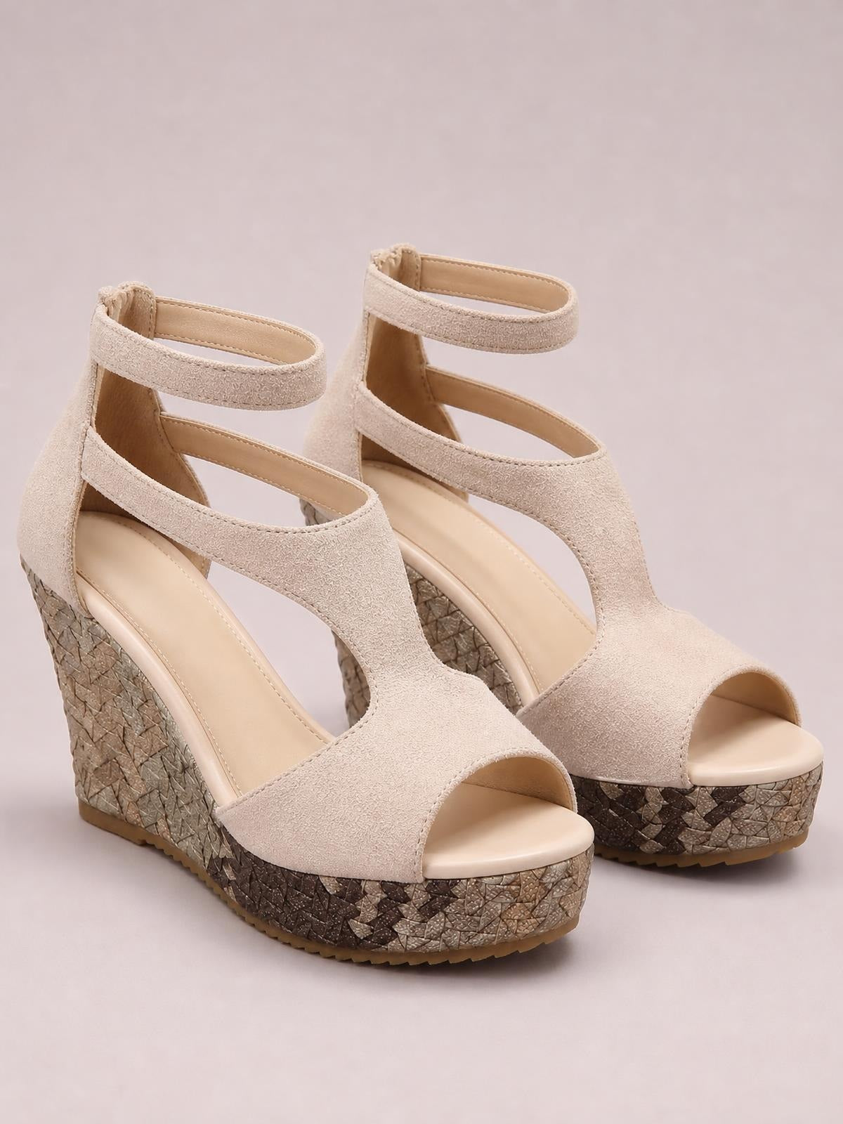 Beige cutout wedge platform sandals feature open toes, ankle straps, wide front bands, and textured woven soles with a high wedge heel.