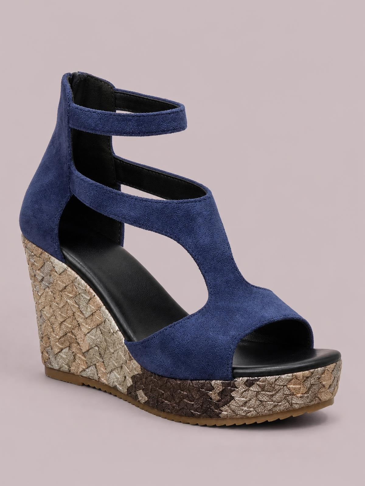 Navy blue cutout wedge platform sandal with an open toe, ankle strap, wide front band, and textured mosaic-patterned high wedge sole.