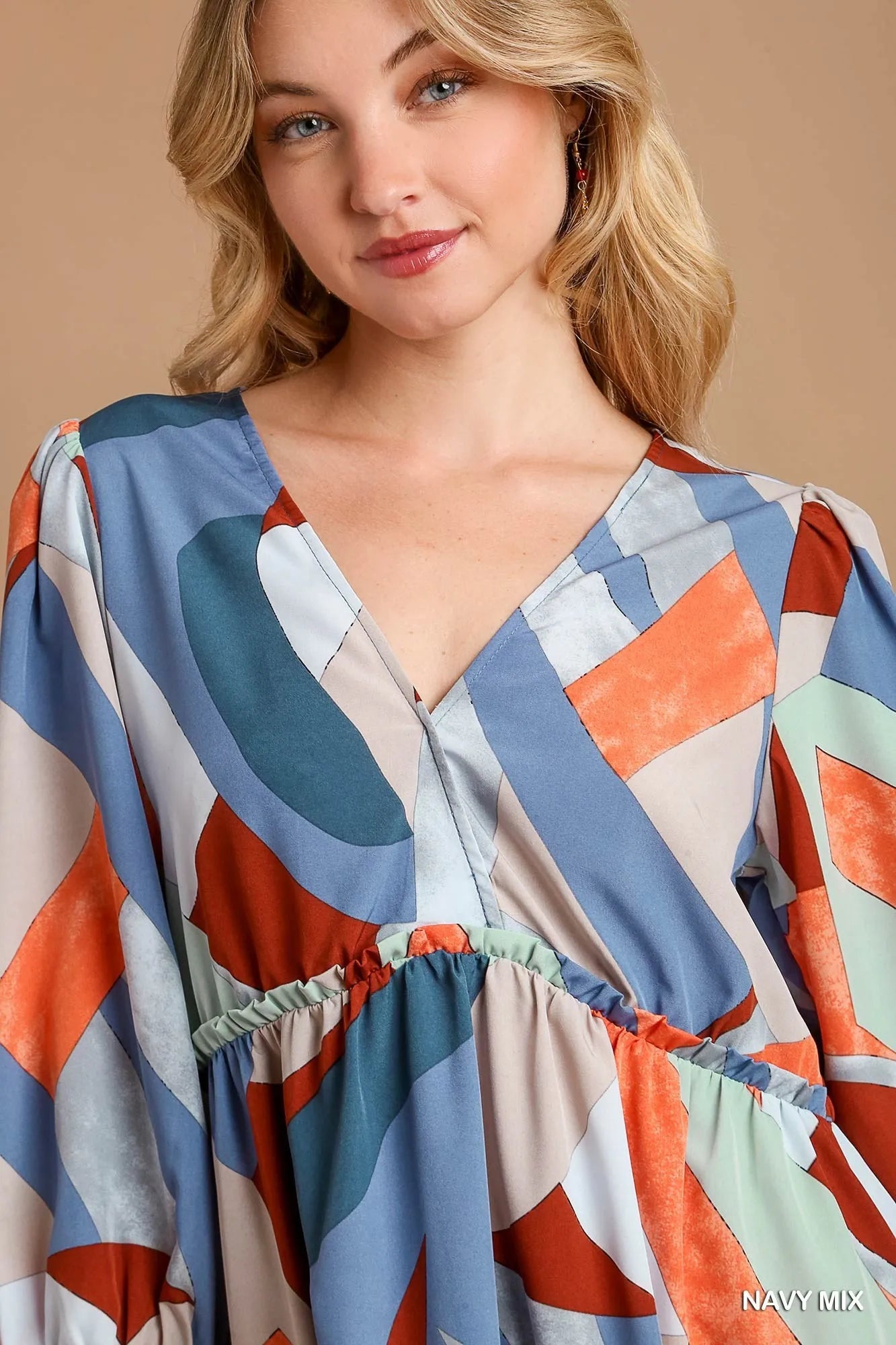 Abstract V-Neck Tiered Printed Dress with Ruffles.