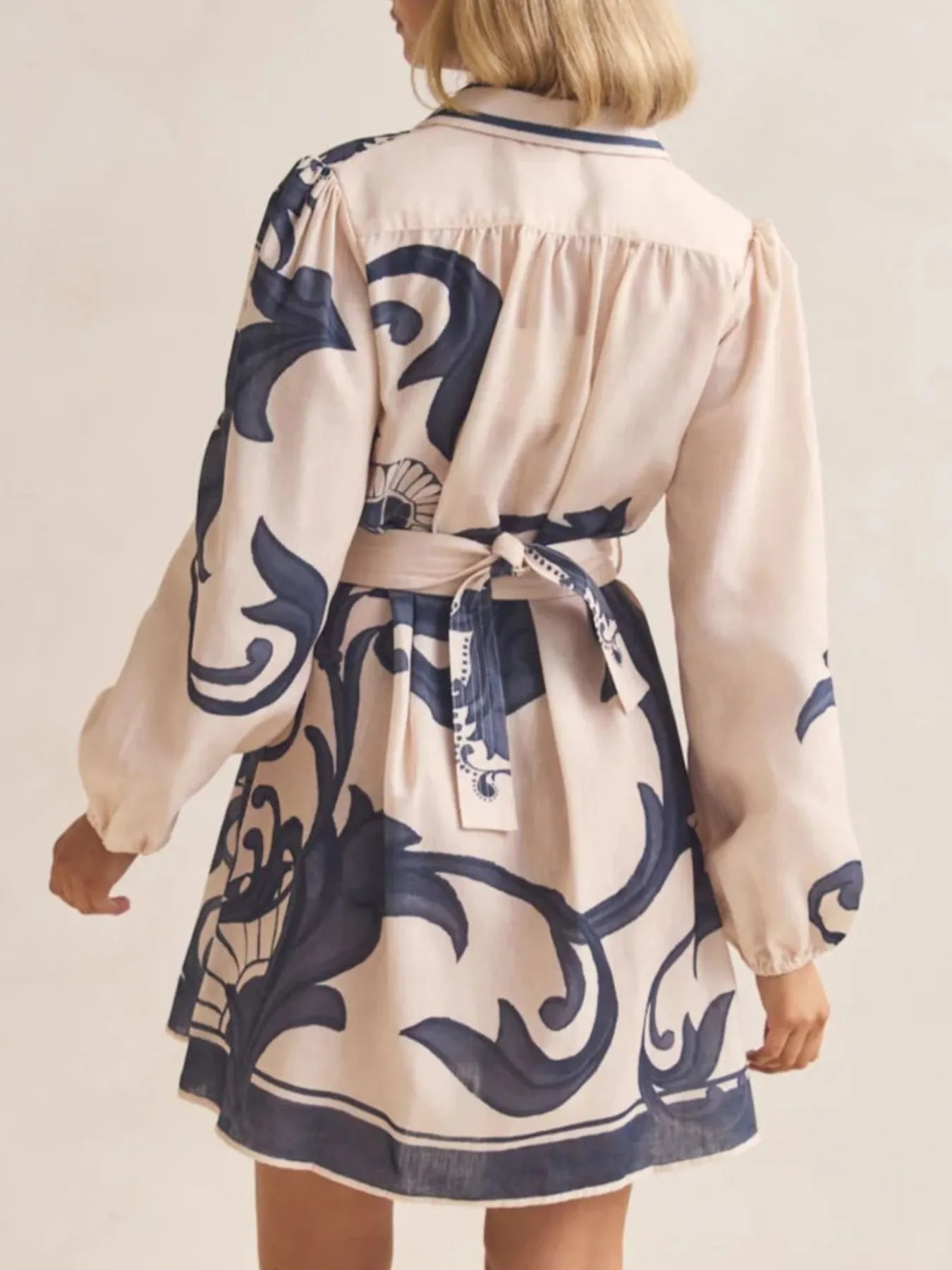 Printed Long Sleeve Shirt Dress with Tied Detail.